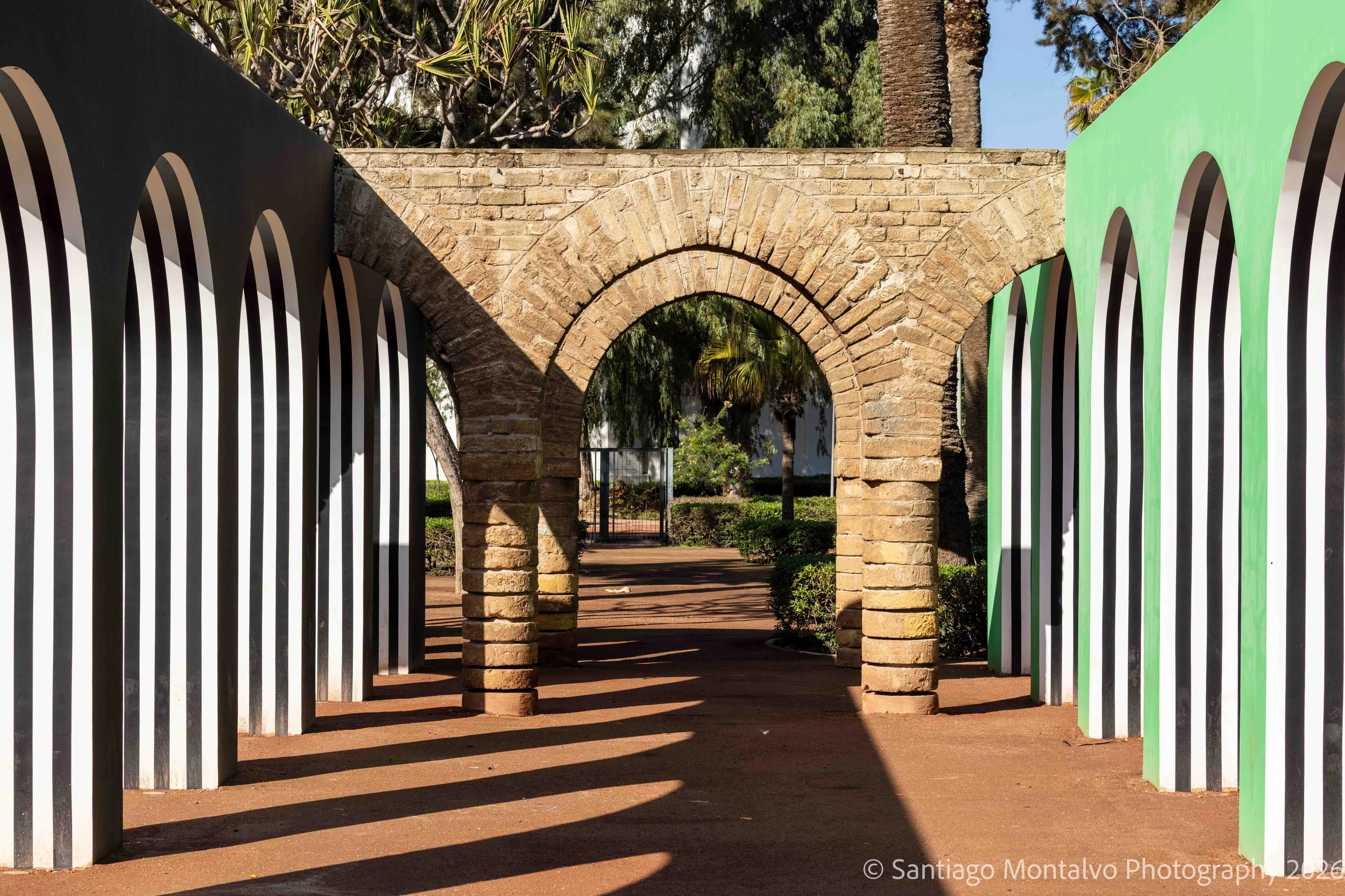 Arches Within Arches — Casablanca, Morocco. A playful architectural perspective combines bold patterns, historic stone, and contemporary color.