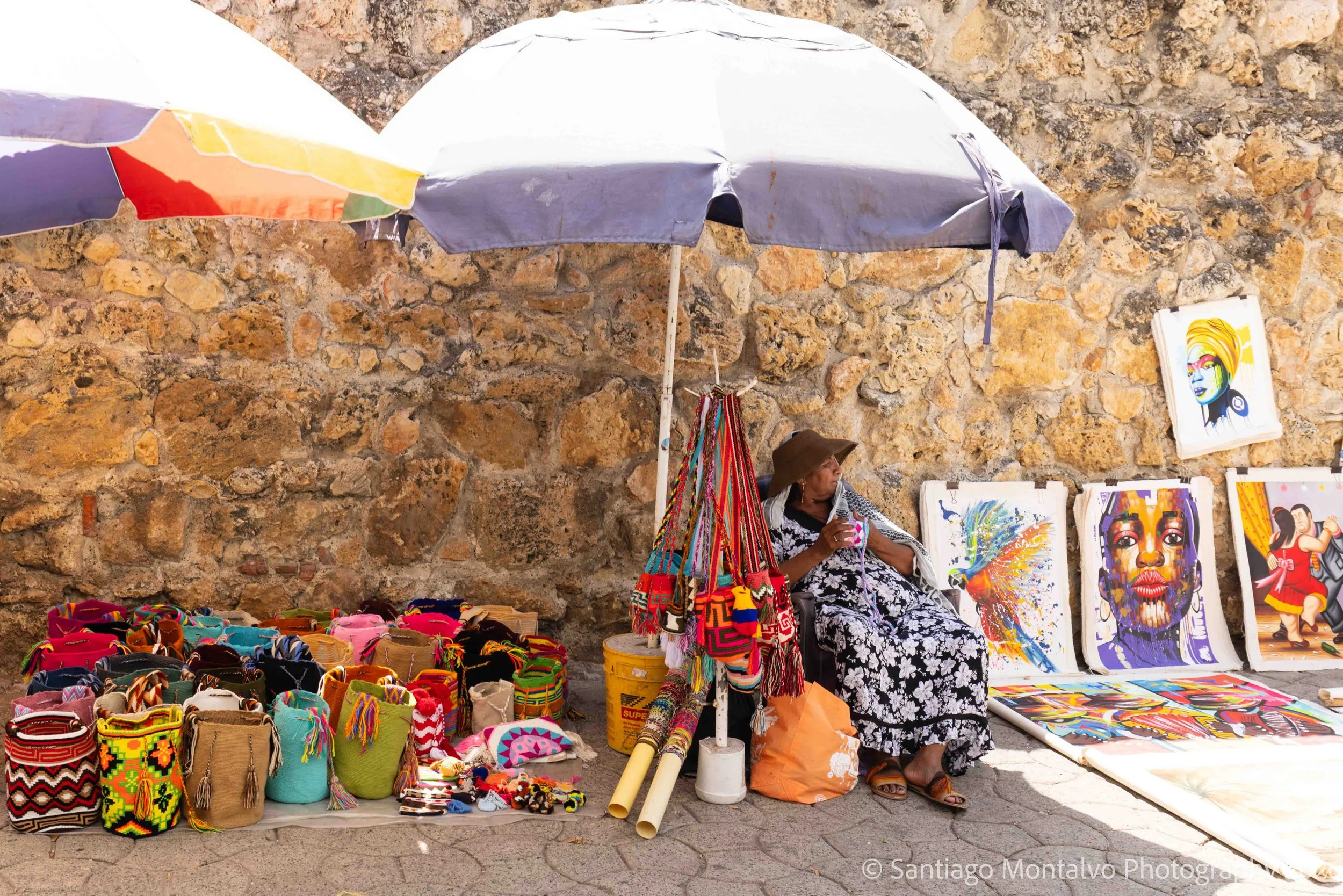 The Colors of Everyday Life — Cartagena, Colombia. A street vendor brings human warmth and character to the colorful city.
