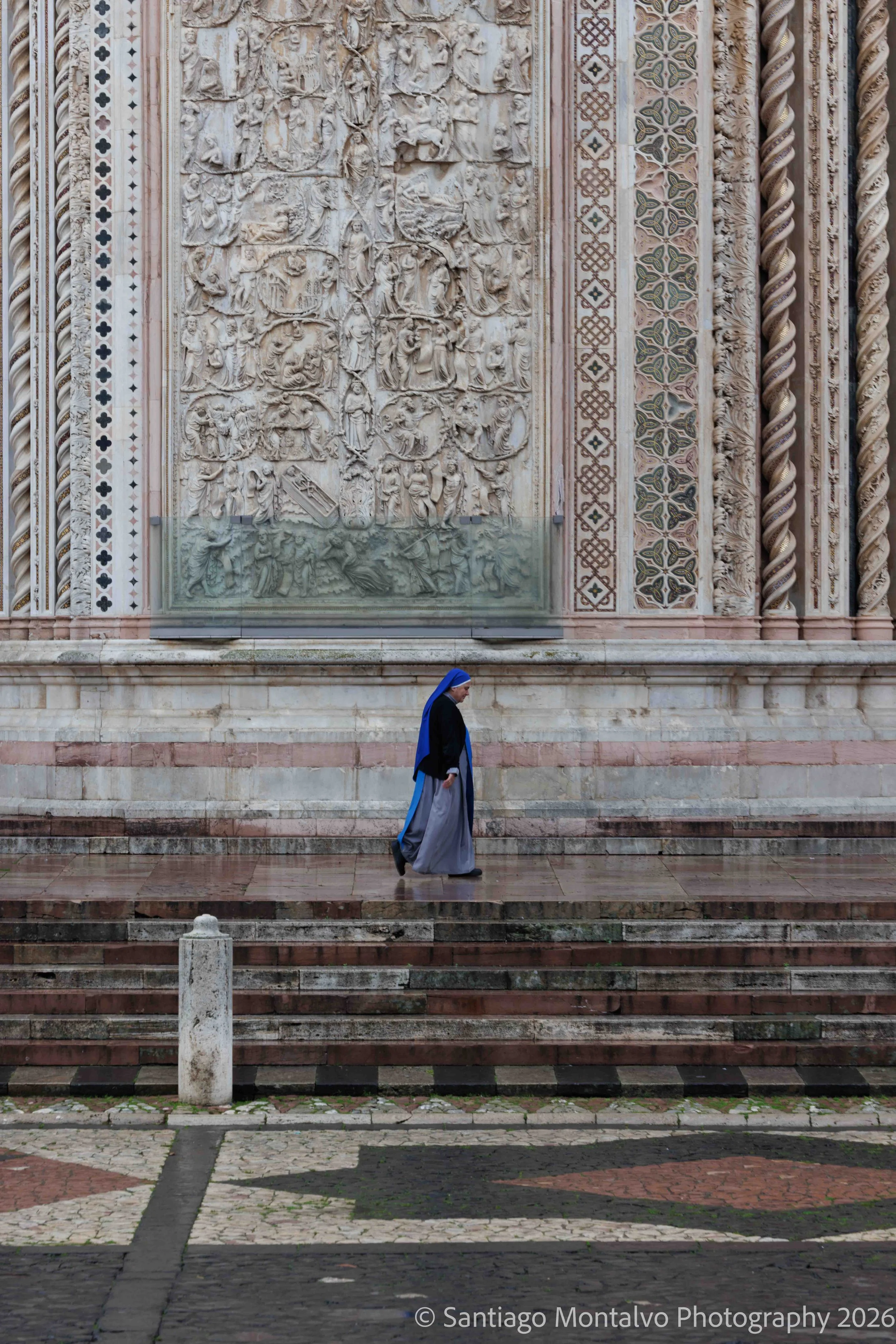A Life of Devotion — Orvieto, Italy. A quiet human moment reflects the living traditions of faith.