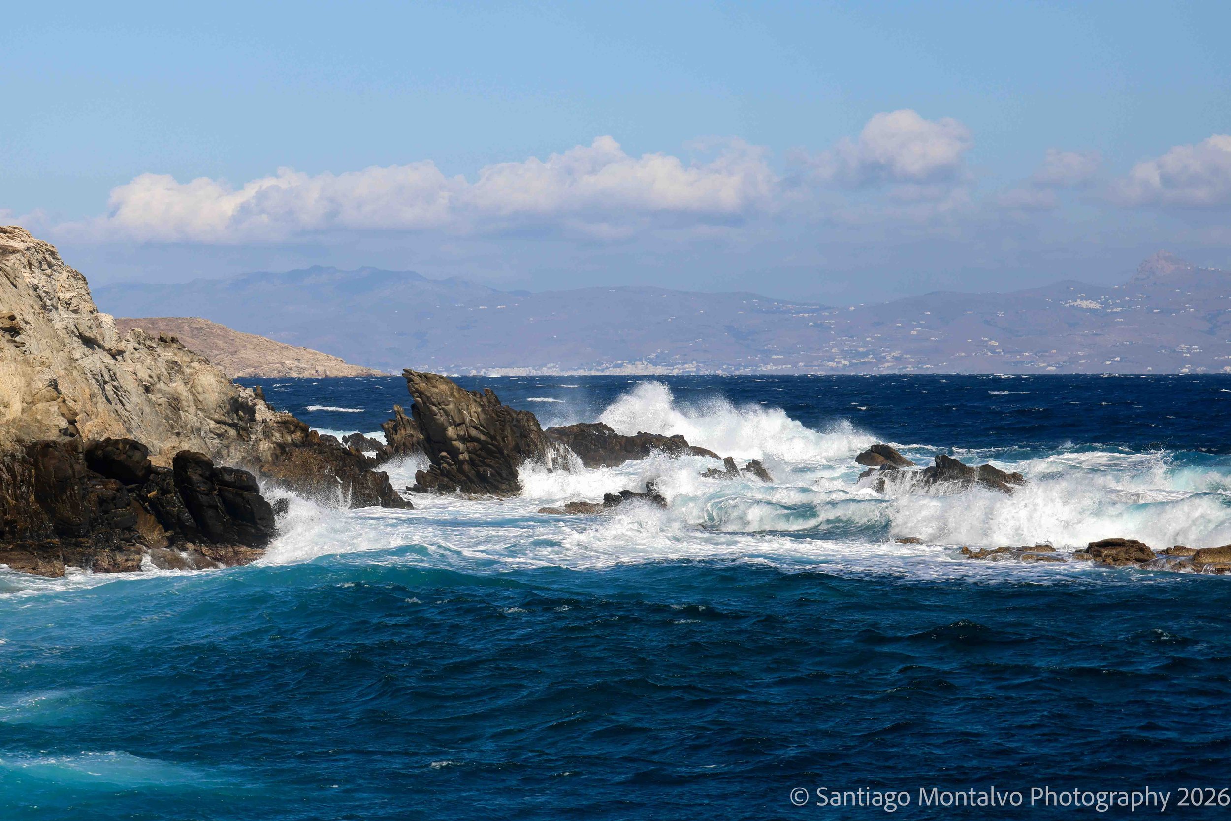 The Restless Sea — Mykonos, Greece. Atlantic-like energy in Mediterranean waves breaking against rocky shores.
