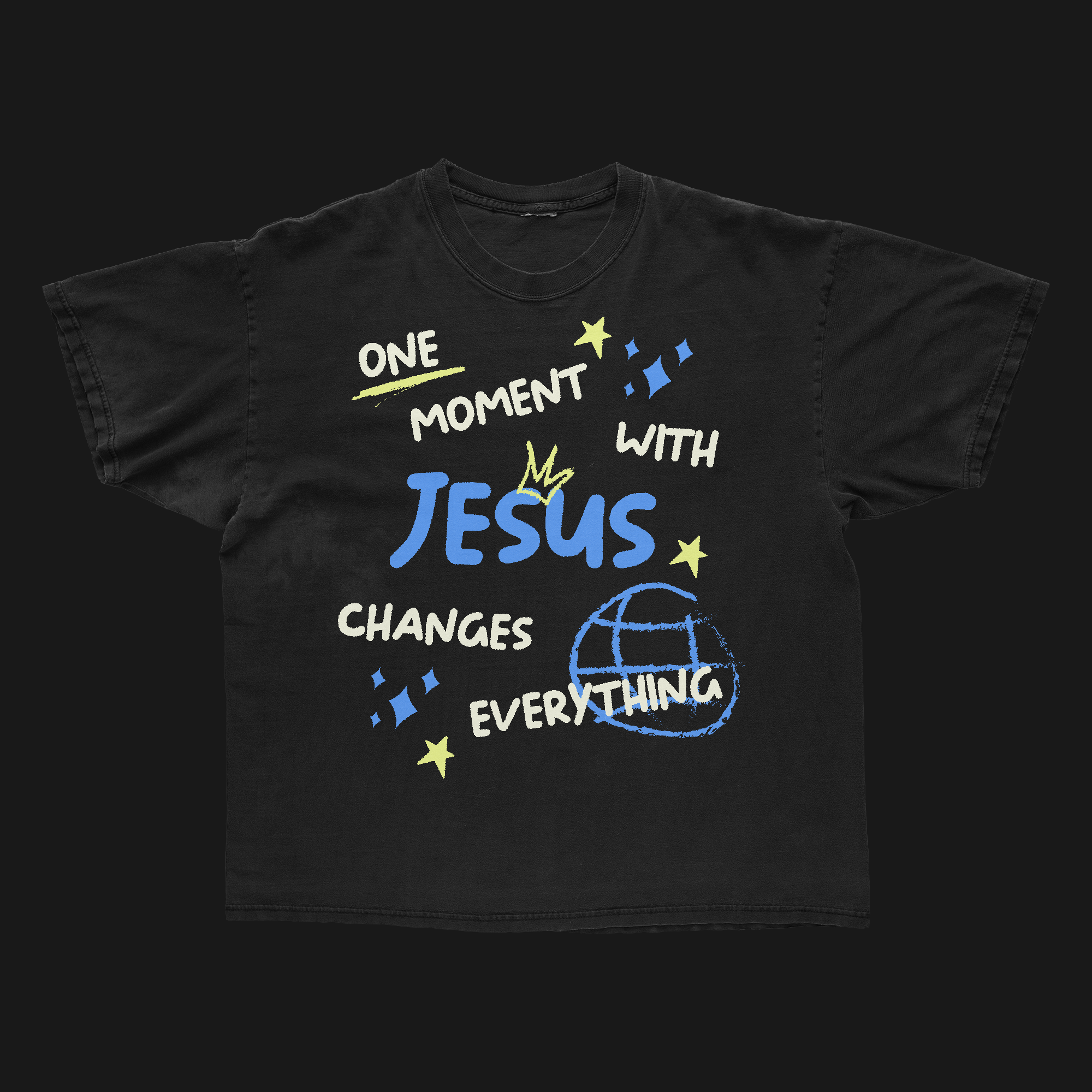 Black T-shirt with colorful text and graphics featuring religious message, stars, and a globe illustration.