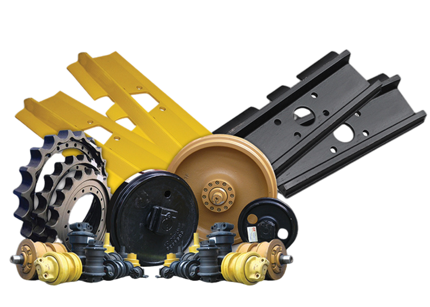 Various rubber tracks, wheels, and rollers for heavy machinery or construction equipment arranged together.
