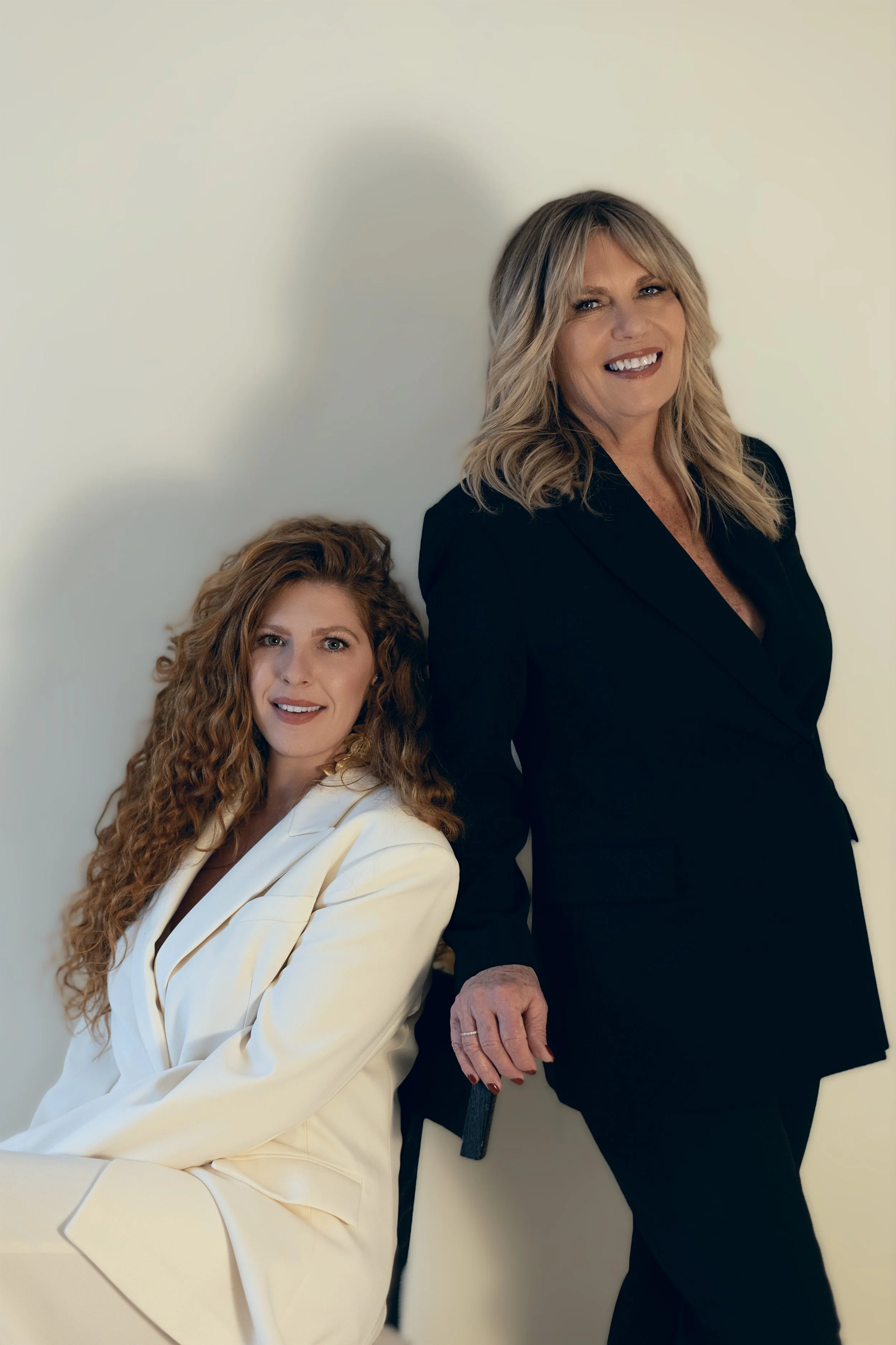 Tessa and Kristen, co-founders of Rooted Salon hair salon in Manlius, New York