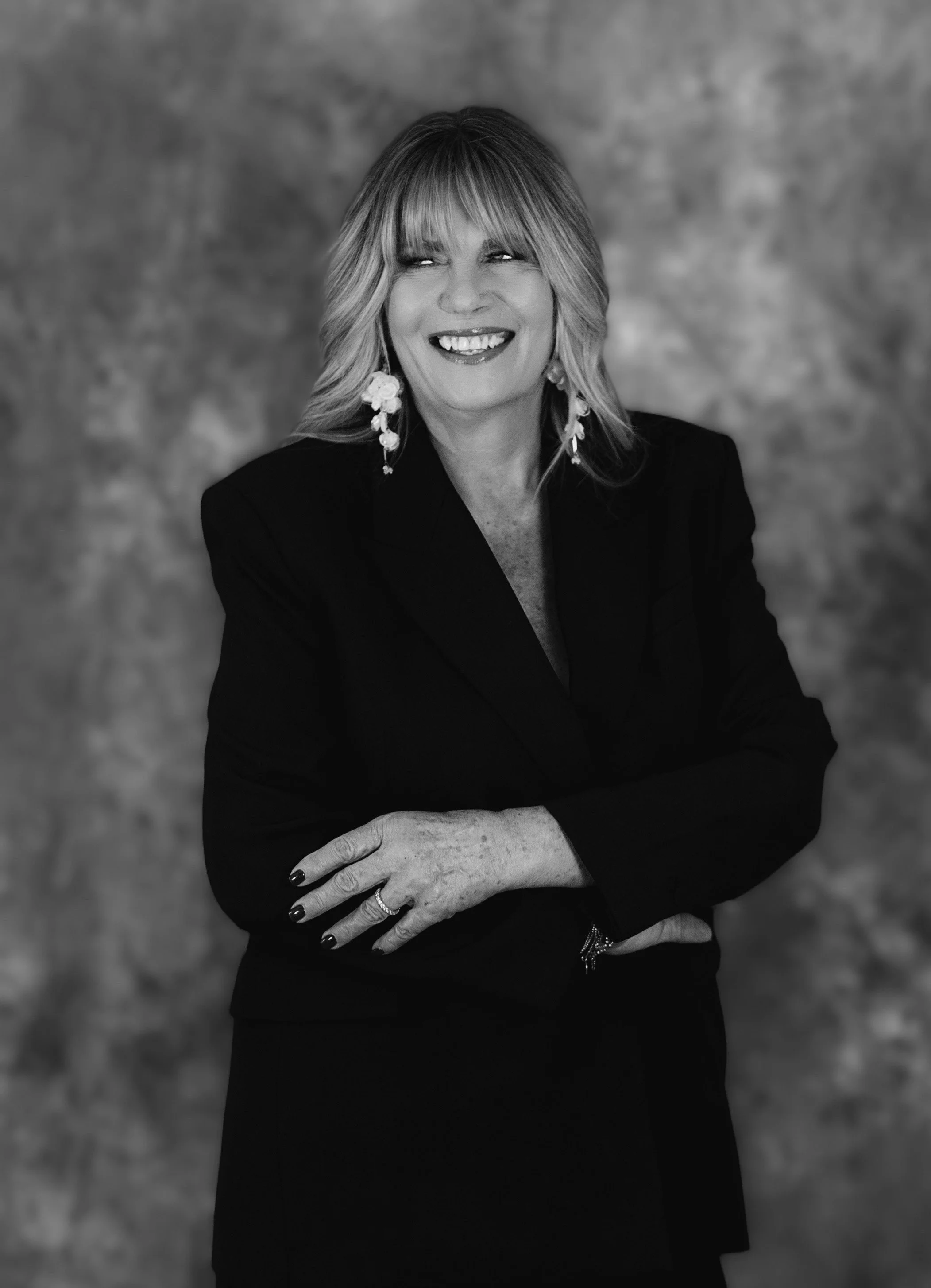 Kristen, co-owner and stylist at Rooted Salon in Manlius New York