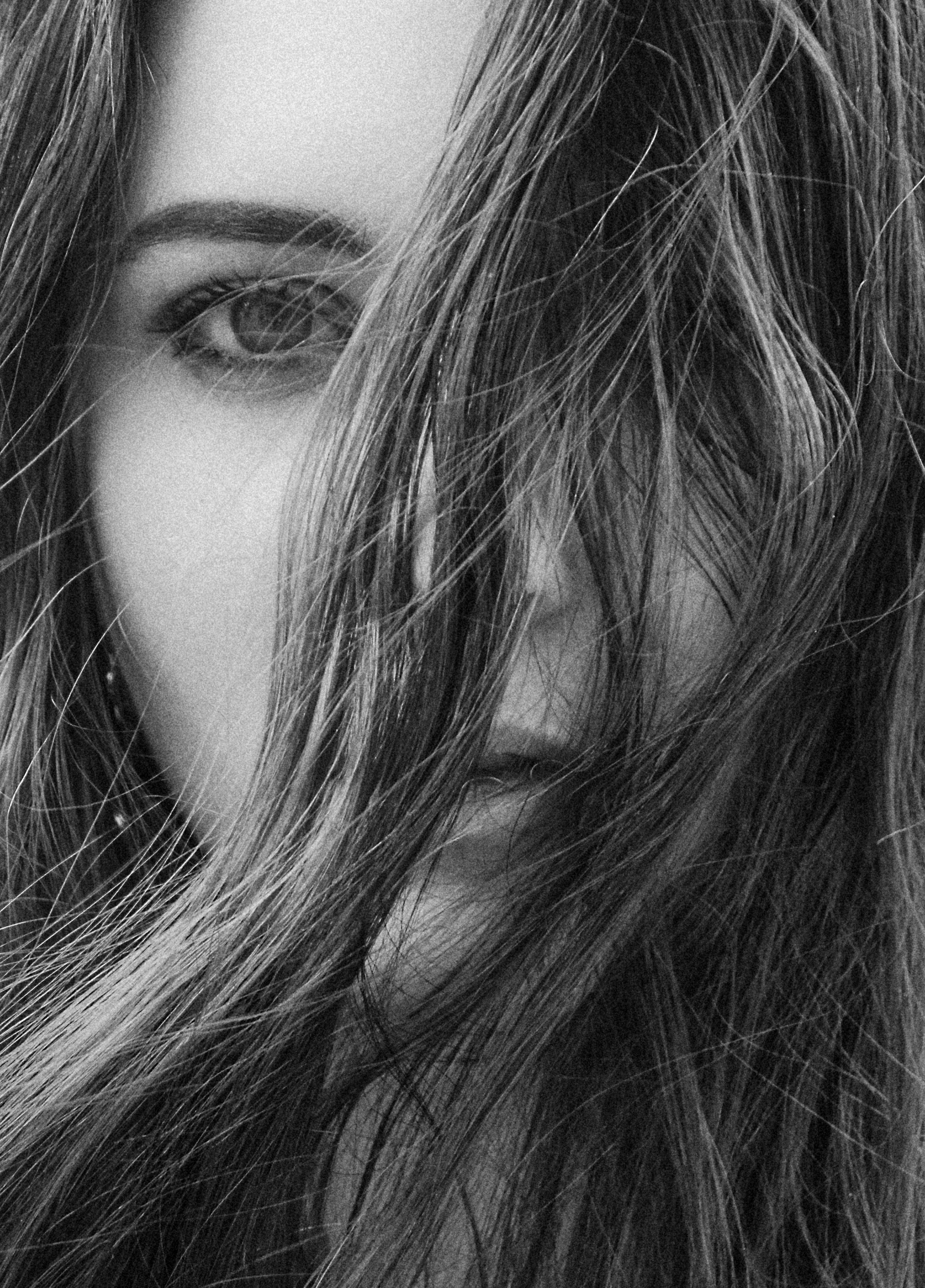 Dimensional brunette hair with soft custom color in modern salon style