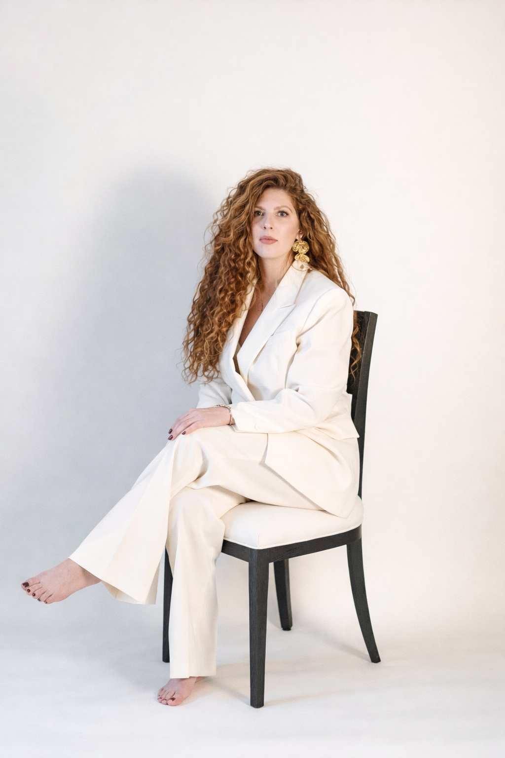 Tessa, co-owner and stylist at Rooted Salon in Manlius New York