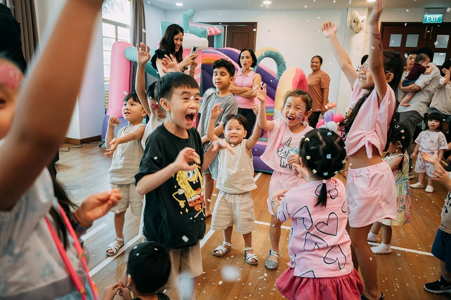 Children jumping happily during a birthday party