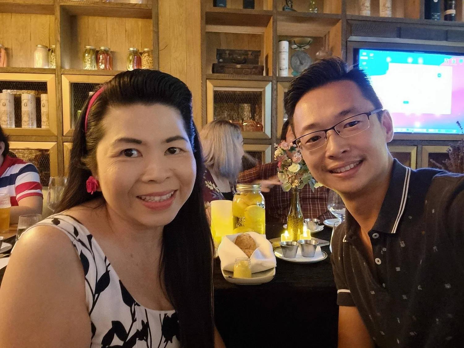 Wedding photographer Vincent taking photograph with Solemniser Joanna in Singapore