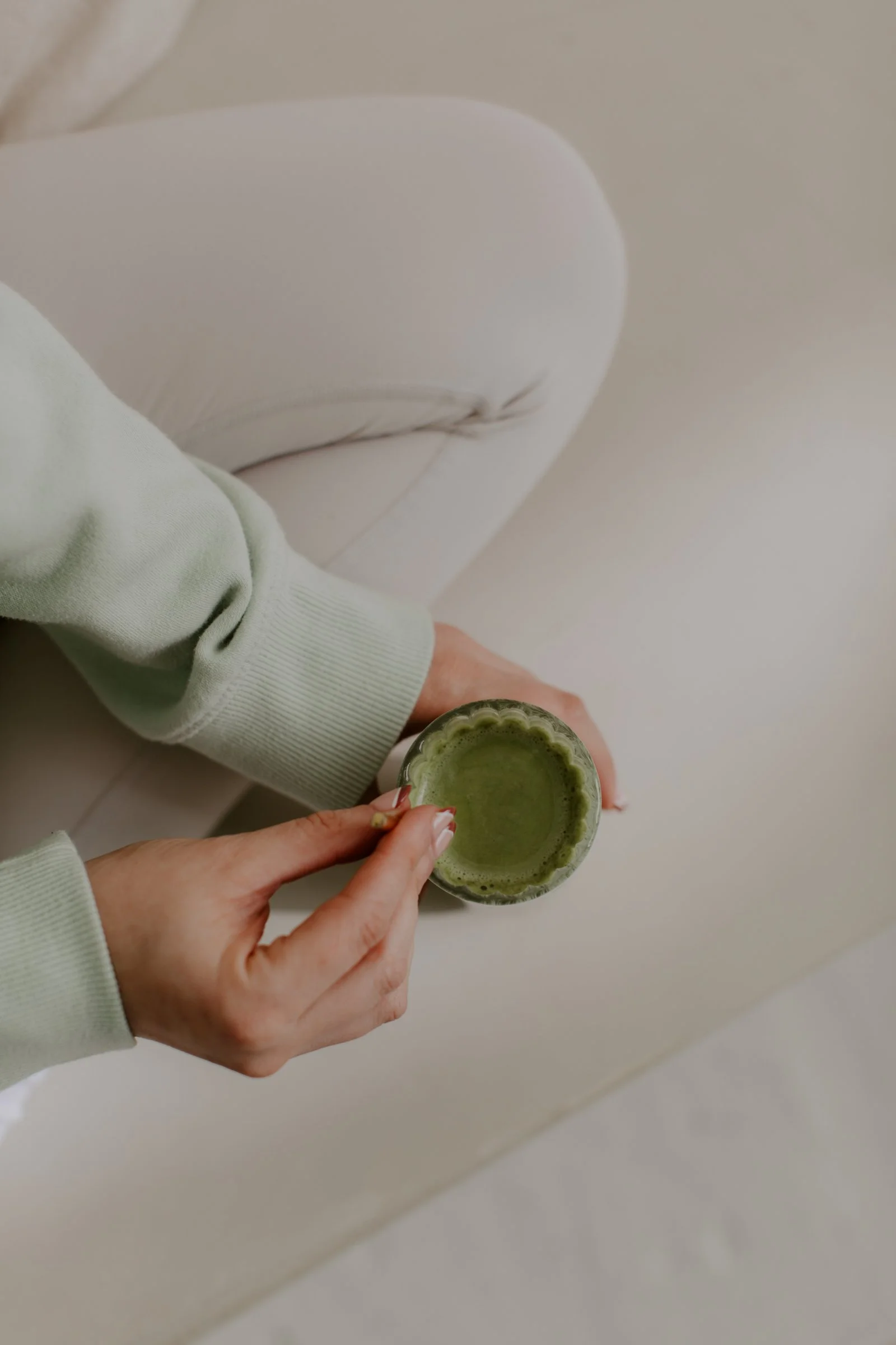 women holding matcha