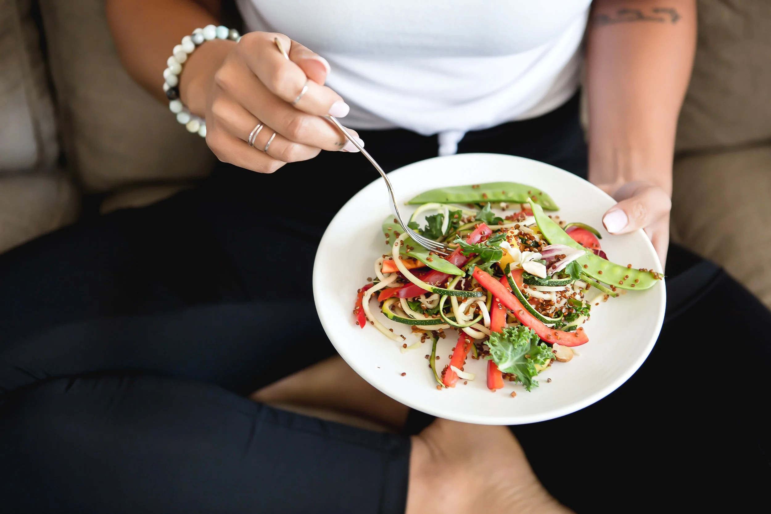 woman eating salad