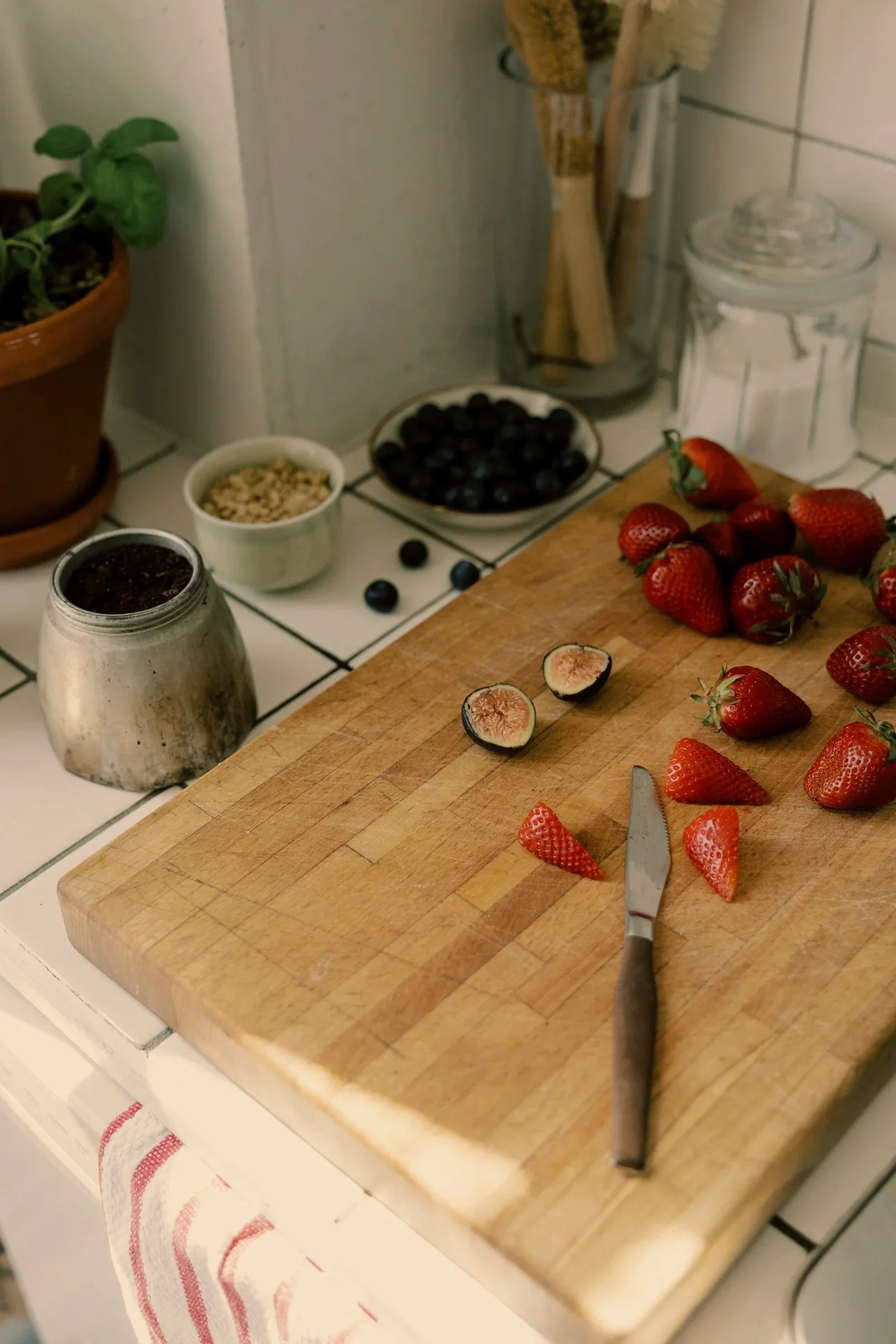 strawberries on a cutting board