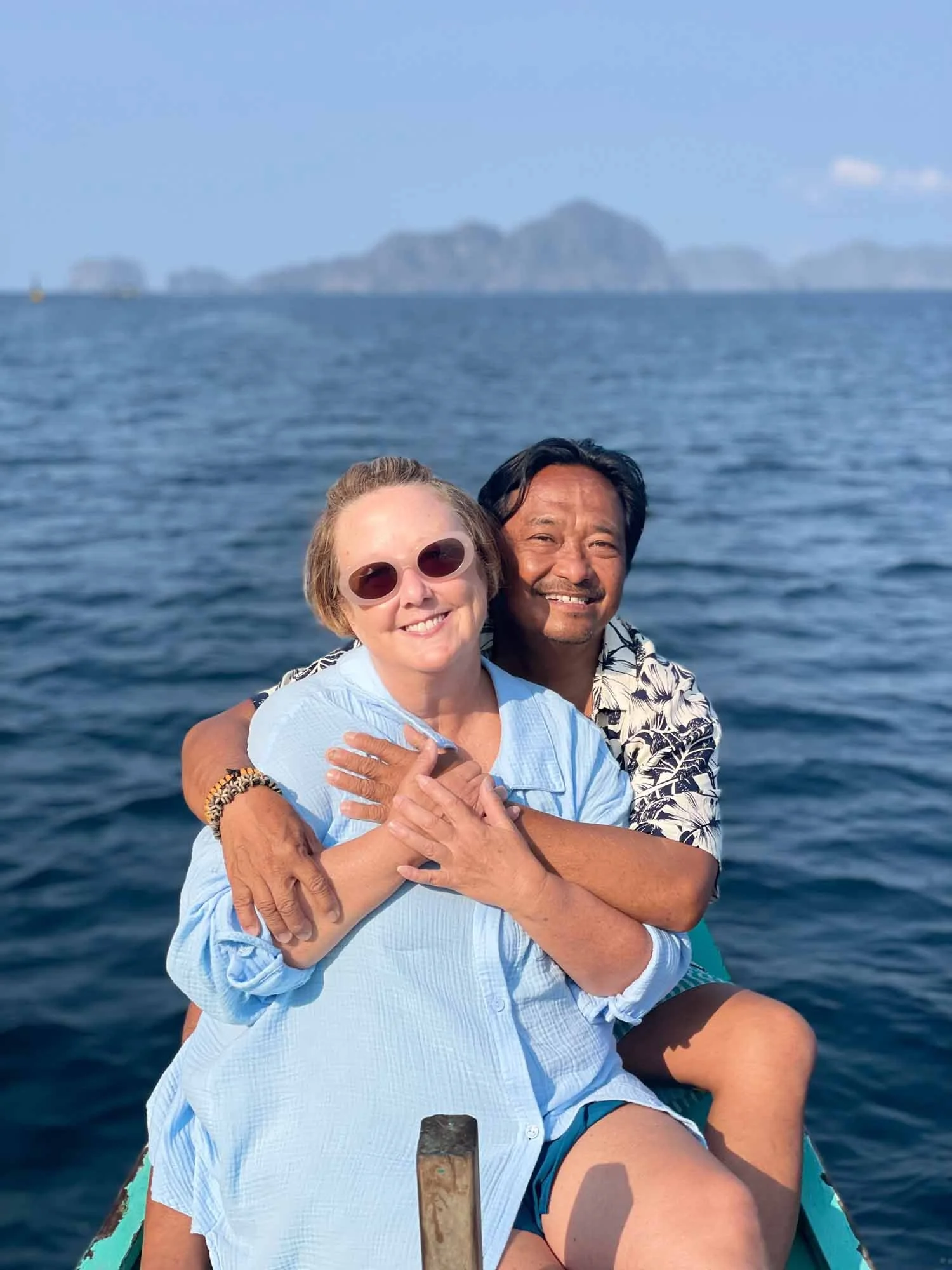 LeAnne Anies and her husband Gus traveling together along the ocean coastline