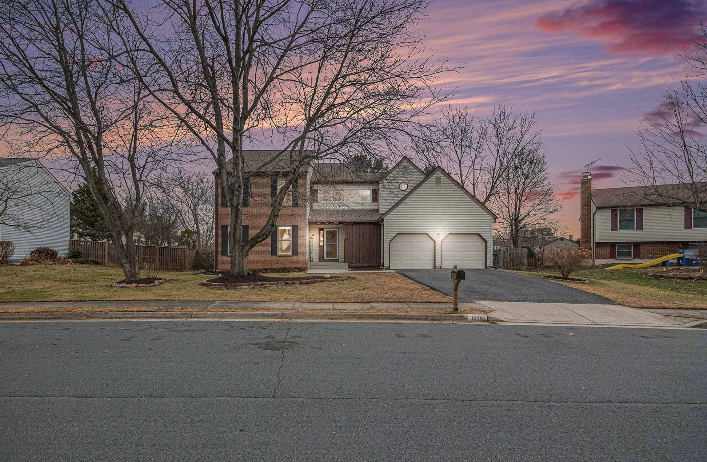 Exterior of a luxury home at sunset in the Northern Virginia real estate market