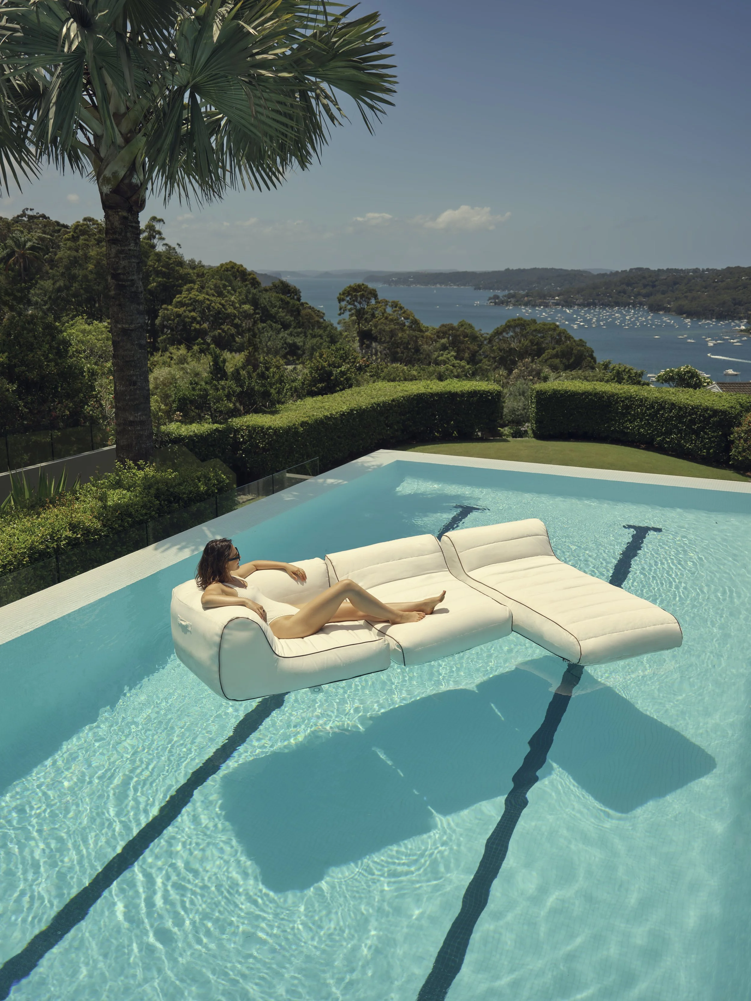 EMBARGOED - NO RELEASE – IN MKT LATE FEB 2025_241219_KING_1977_POOL_FLOATS_12_Pool Floats_Corner_Chair_Chaise_White_0775-Recovered.jpg