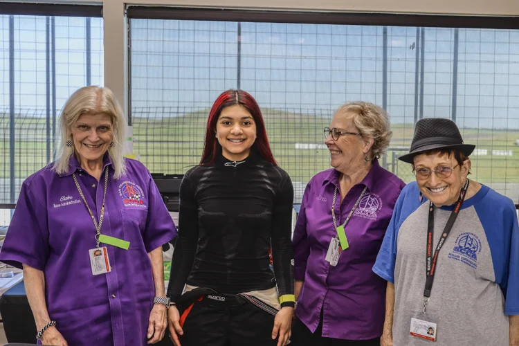 Ana Palestro with track volunteers