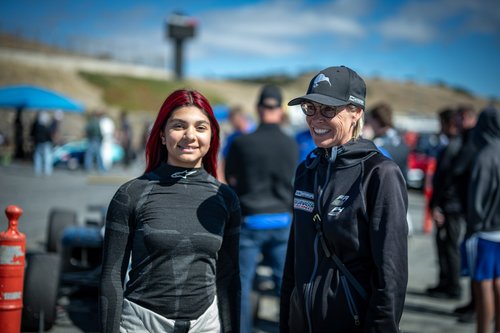 Ana Palestro with a supporter in the Laguna Seca paddock, June 2026