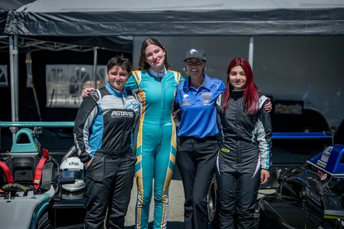 Ana Palestro with fellow Women's Racing Series drivers in the Laguna Seca paddock, June 2026