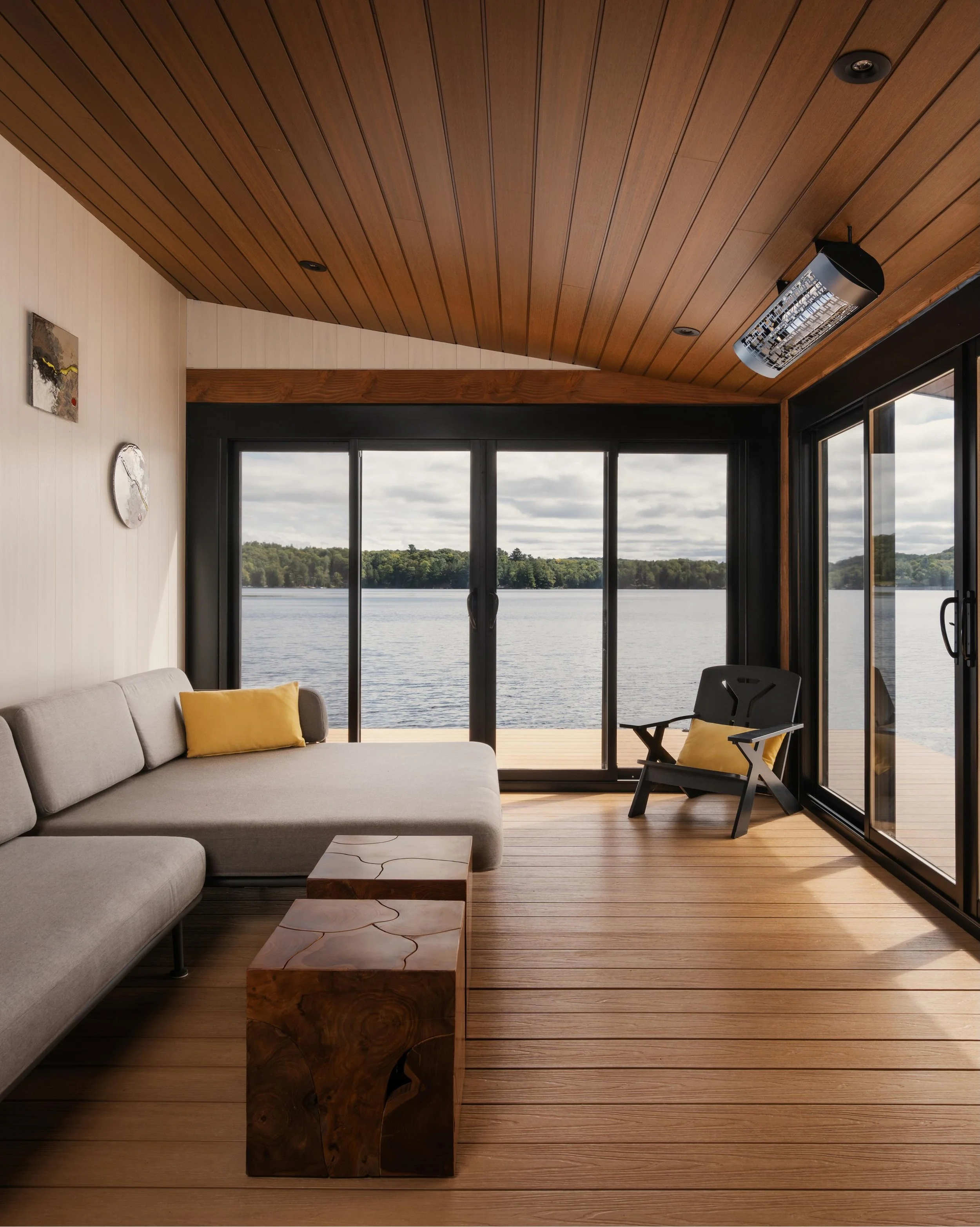 Our South Portage Boathouse indoor lounge is the place to be ⁠on a sunny afternoon at the lake.⁠
⁠
This thermally protected lounge is designed for year-round use, featuring integrated recessed lighting, full-height glazing and durable timber finishes