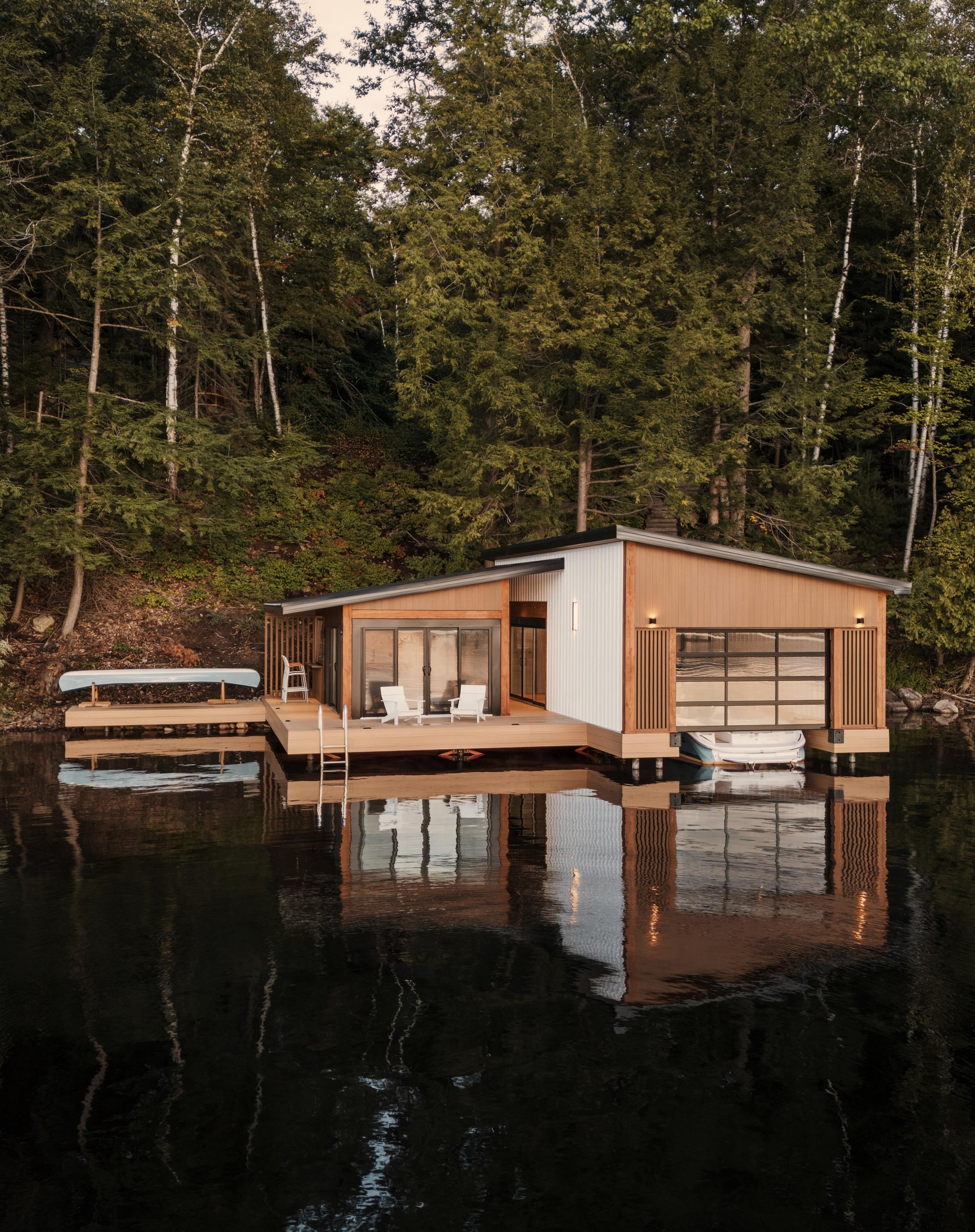 Our South Portage Boathouse cuts a serene silhouette on Lake Muskoka. ⁠
⁠
⁠Contractor: @bredinbrothers⁠
Architect: @duenorthdesign⁠
Designer: @tu_anh1901⁠
Project Manager: Josh Otermanns⁠
Site Supervisor: Nolan Bredin ⁠
Building Materials &amp; Timbe