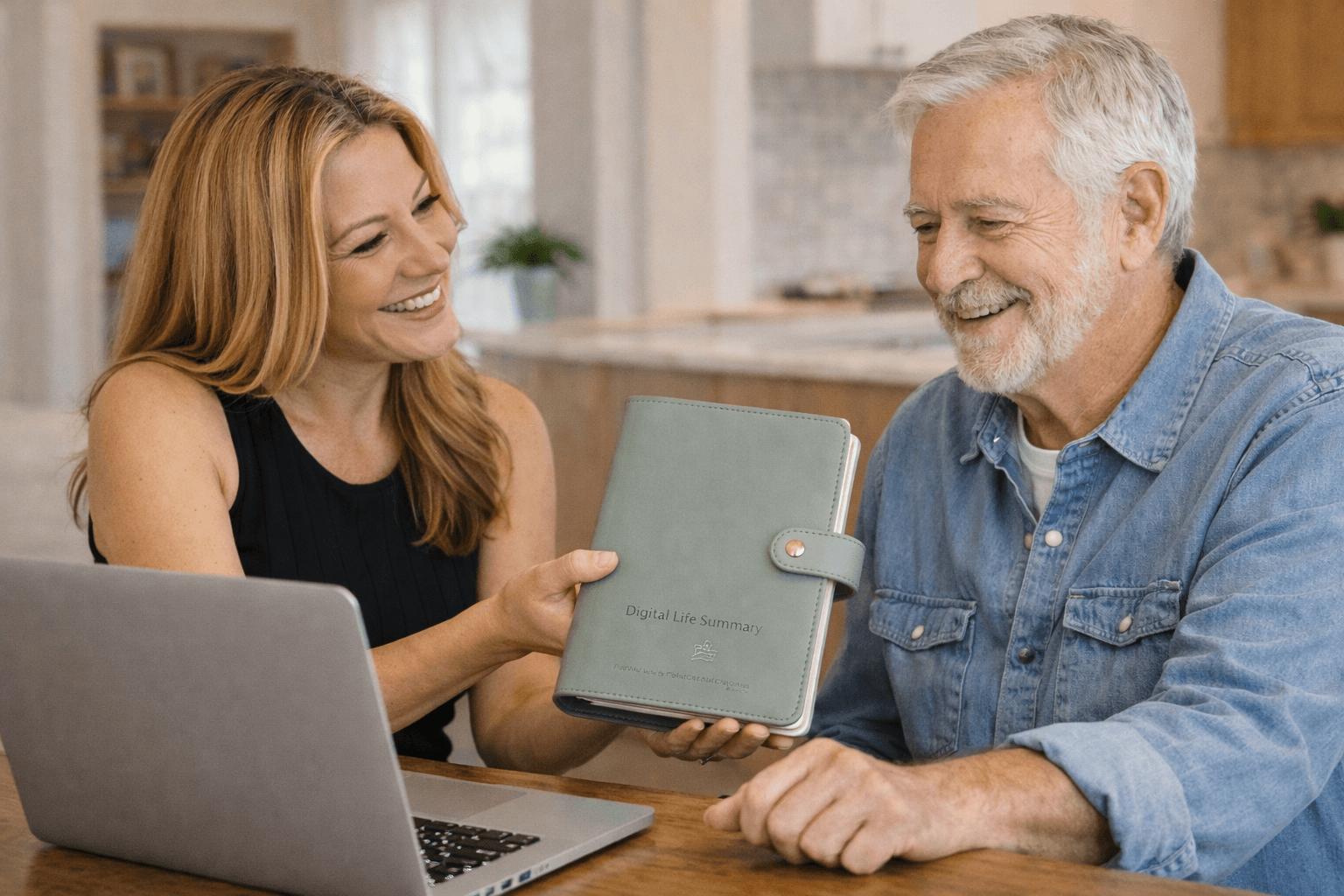 A woman presenting a digital life summary planner to a smiling older man at a wooden table in a cozy, well-lit home kitchen.