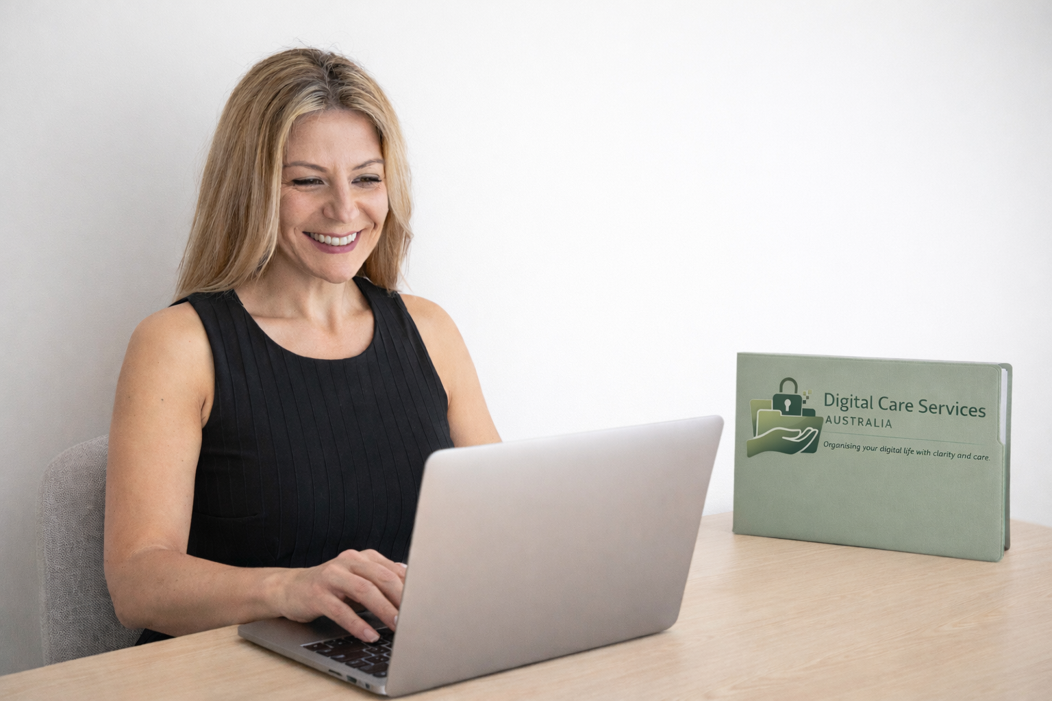 glory-working-at-desk-with-laptop