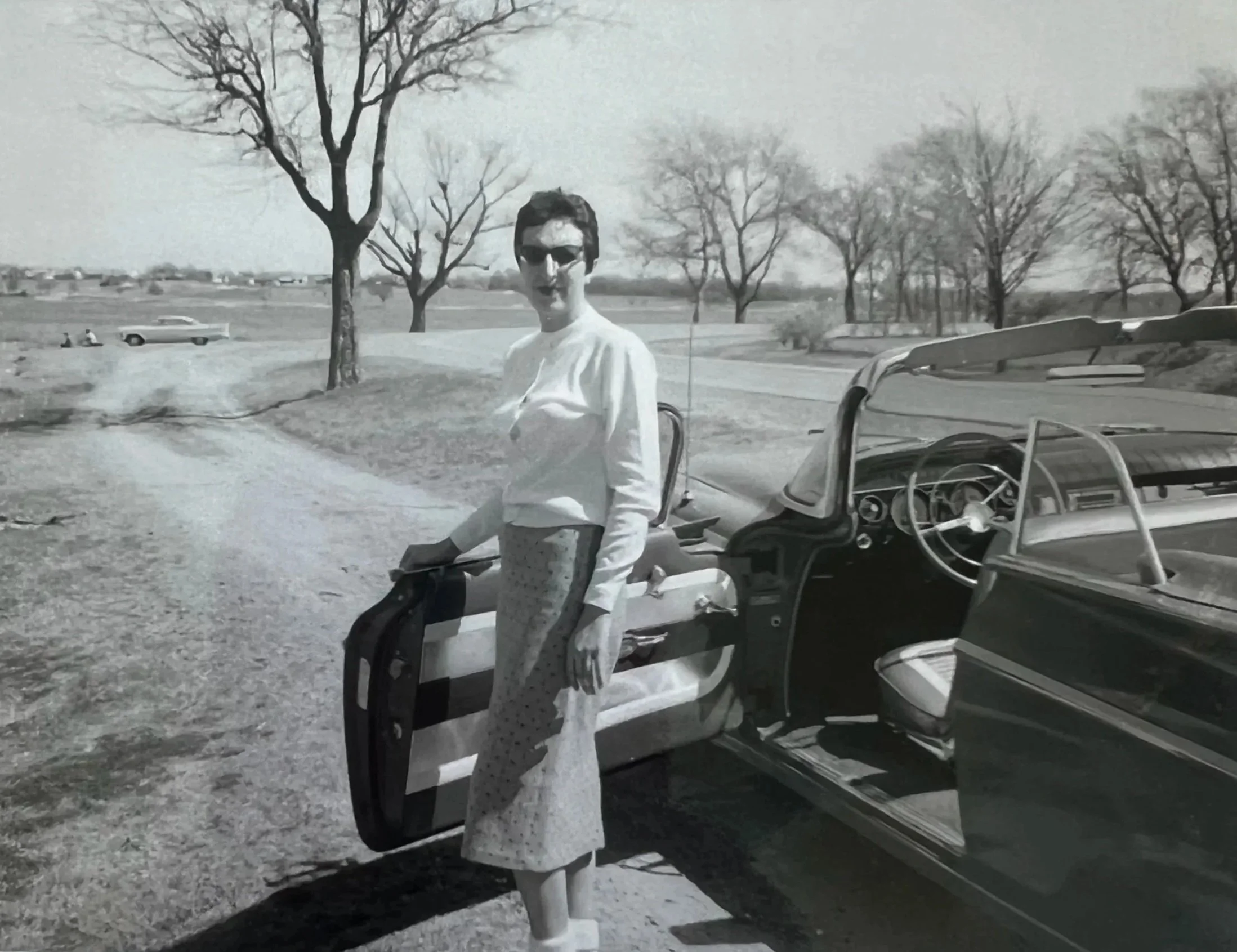 Woman in vintage setting wearing fine jewelry, representing personal style and individuality