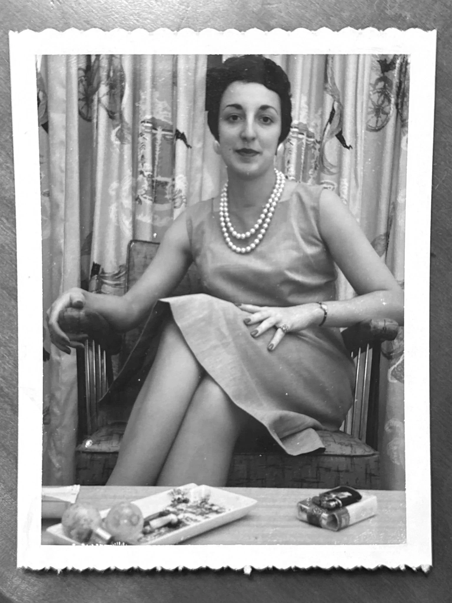 Vintage portrait of woman wearing fine jewelry, representing generational legacy and personal style