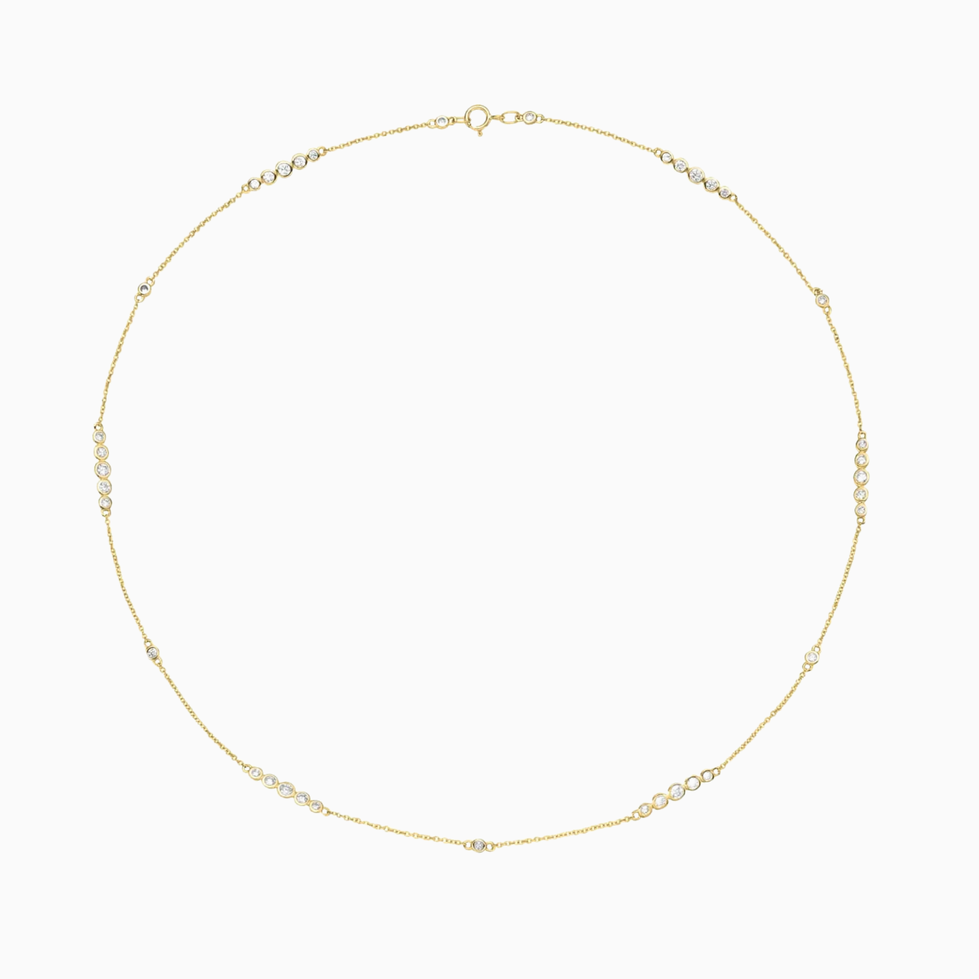 14K yellow gold graduated diamond station necklace with bezel-set natural diamonds.png