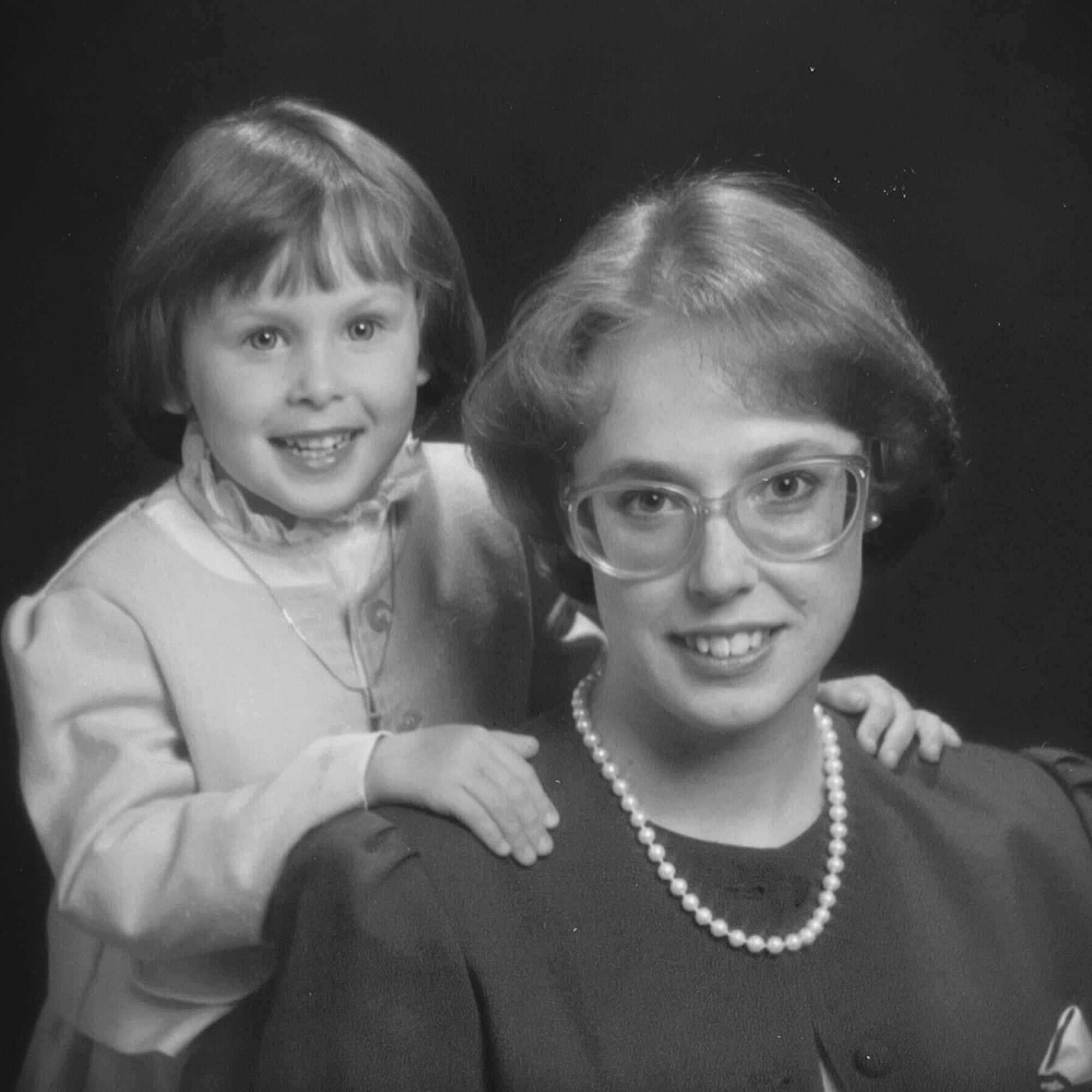 Mother and daughter portrait from the 1980s showing generational connection and family legacy