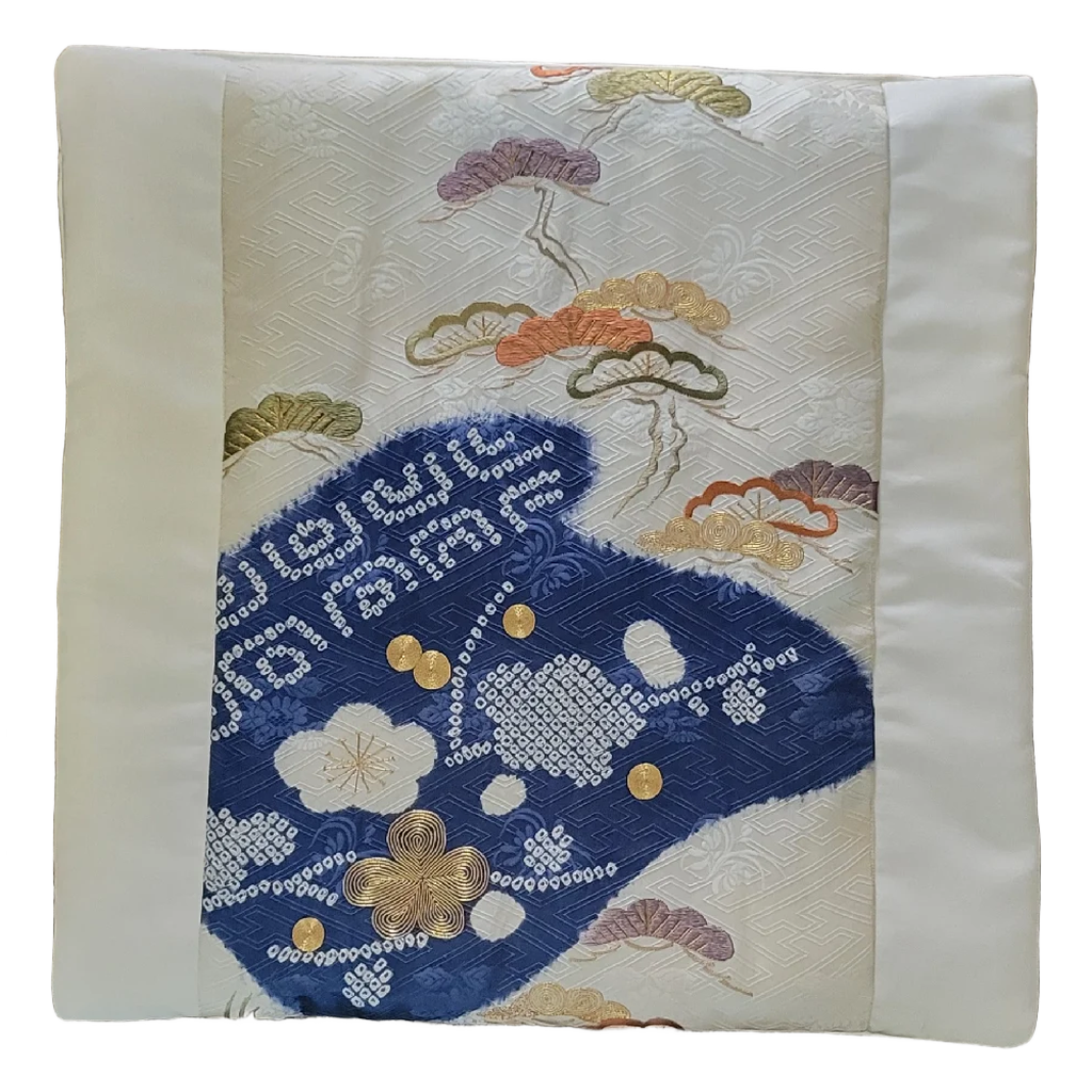 Indigo Horizon decorative pillow handcrafted from authentic vintage Japanese obi silk featuring indigo shibori-inspired patterns, embroidered pine branches, and ivory silk.