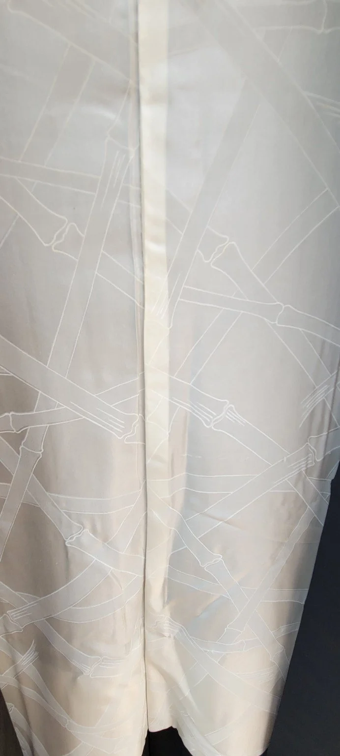 Ivory silk haori lining patterned with overlapping Japanese Bamboo rods