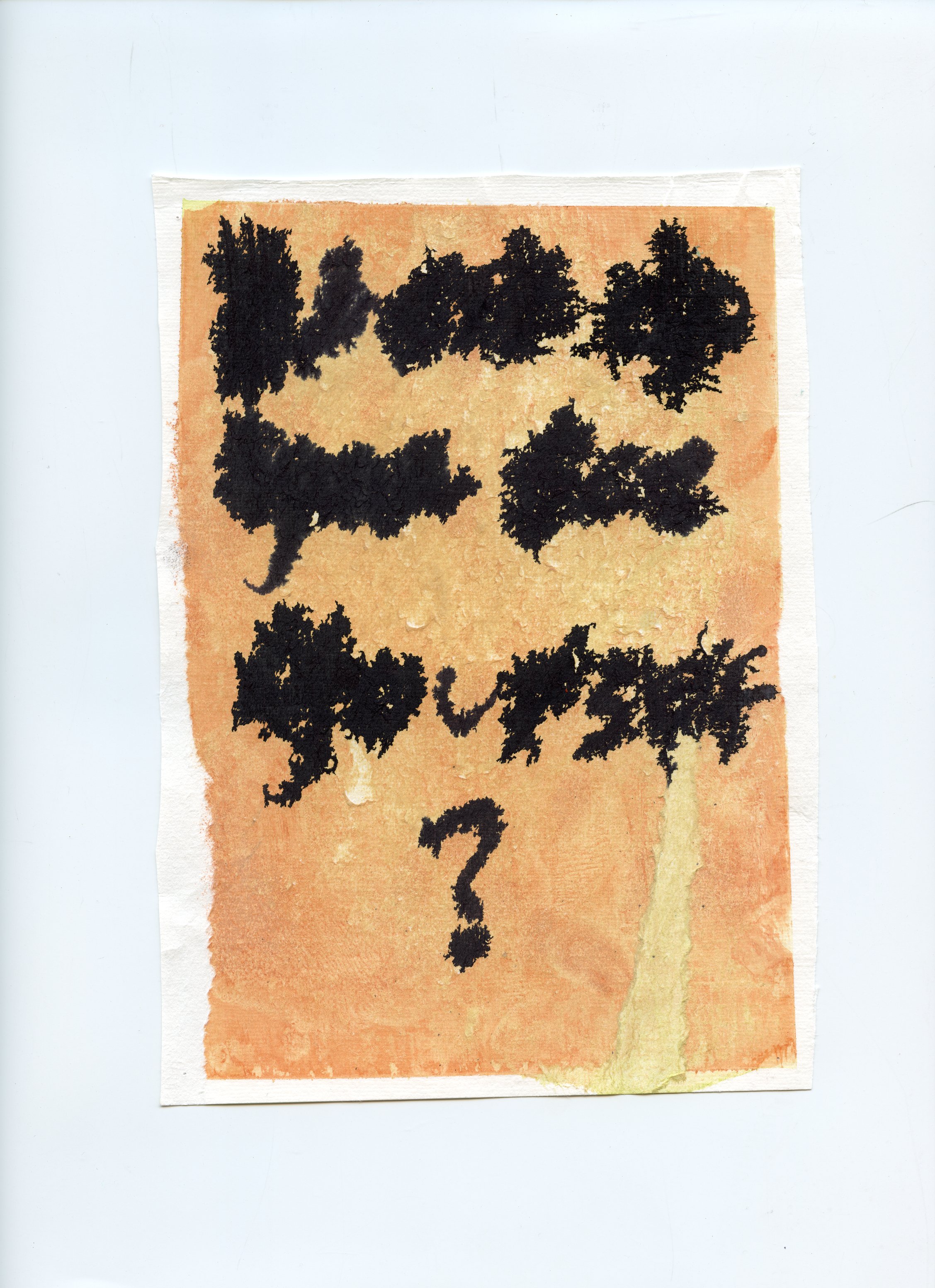 A sheet of paper with black ink blot writing with a question mark below.