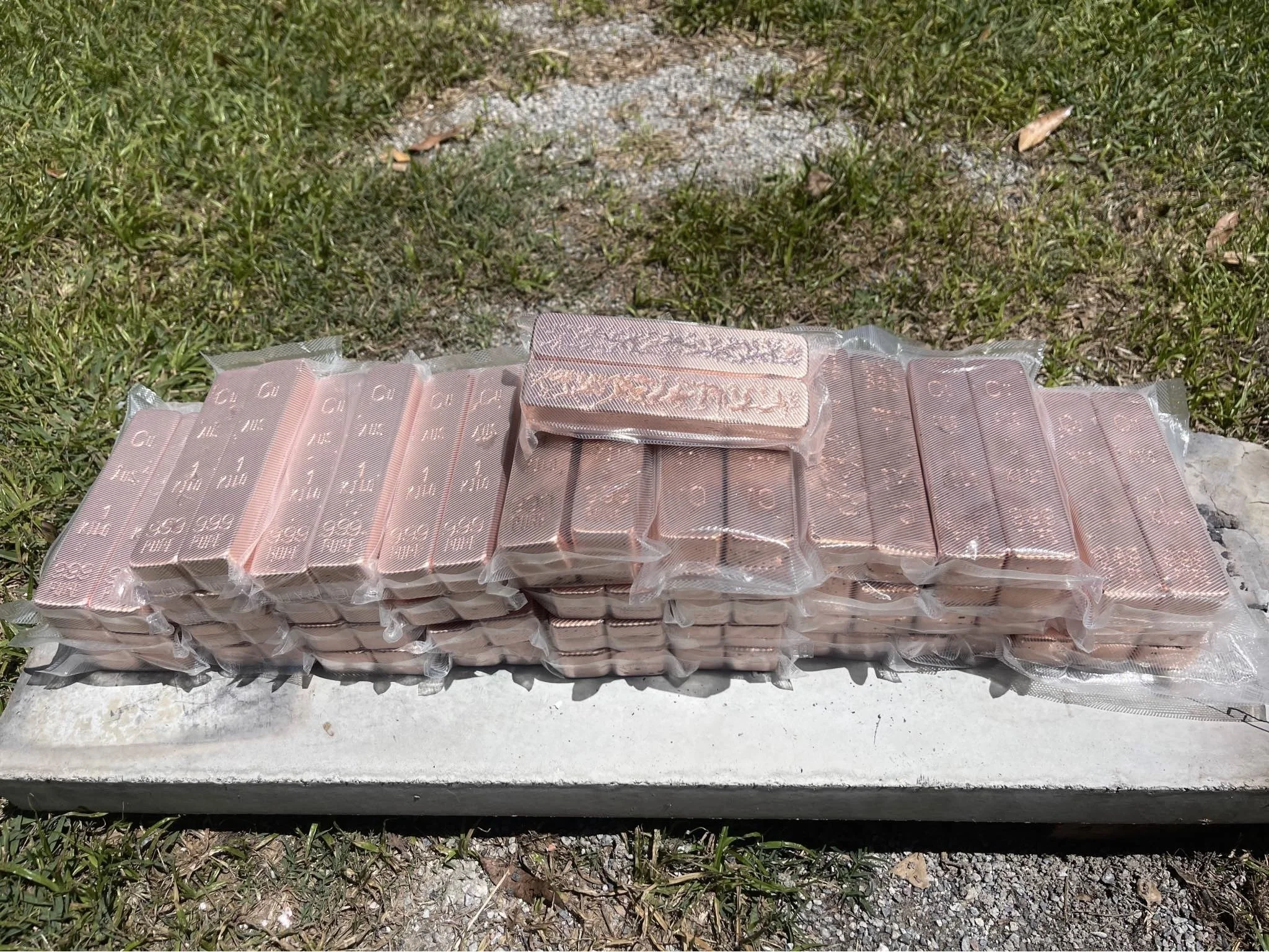 Stacked copper bullion bars in bulk 999 fine Hinterland Bullion Co Australia