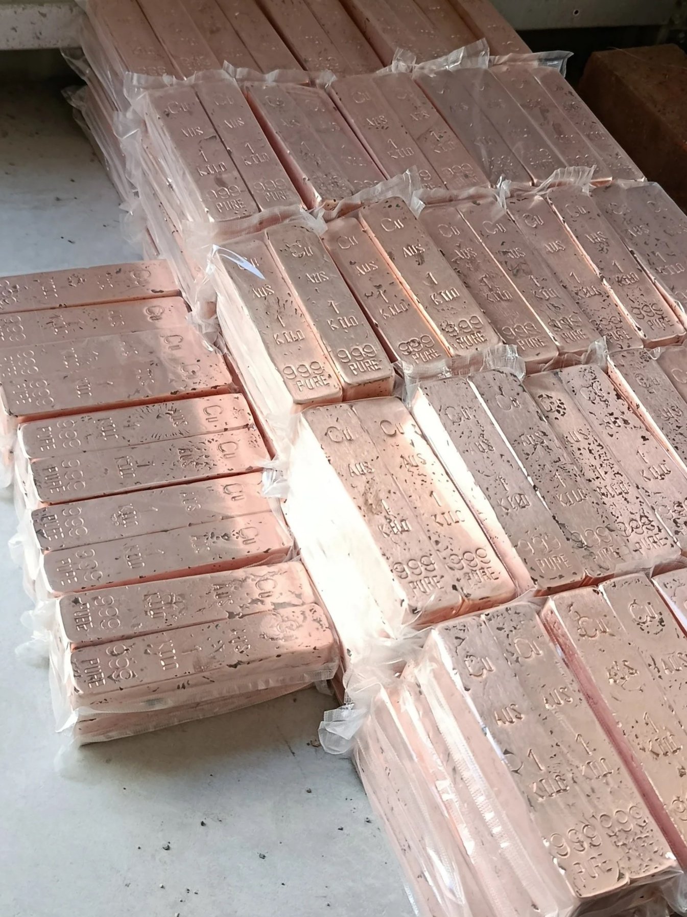 Bulk copper bullion bars wrapped and stacked 999 fine Australia