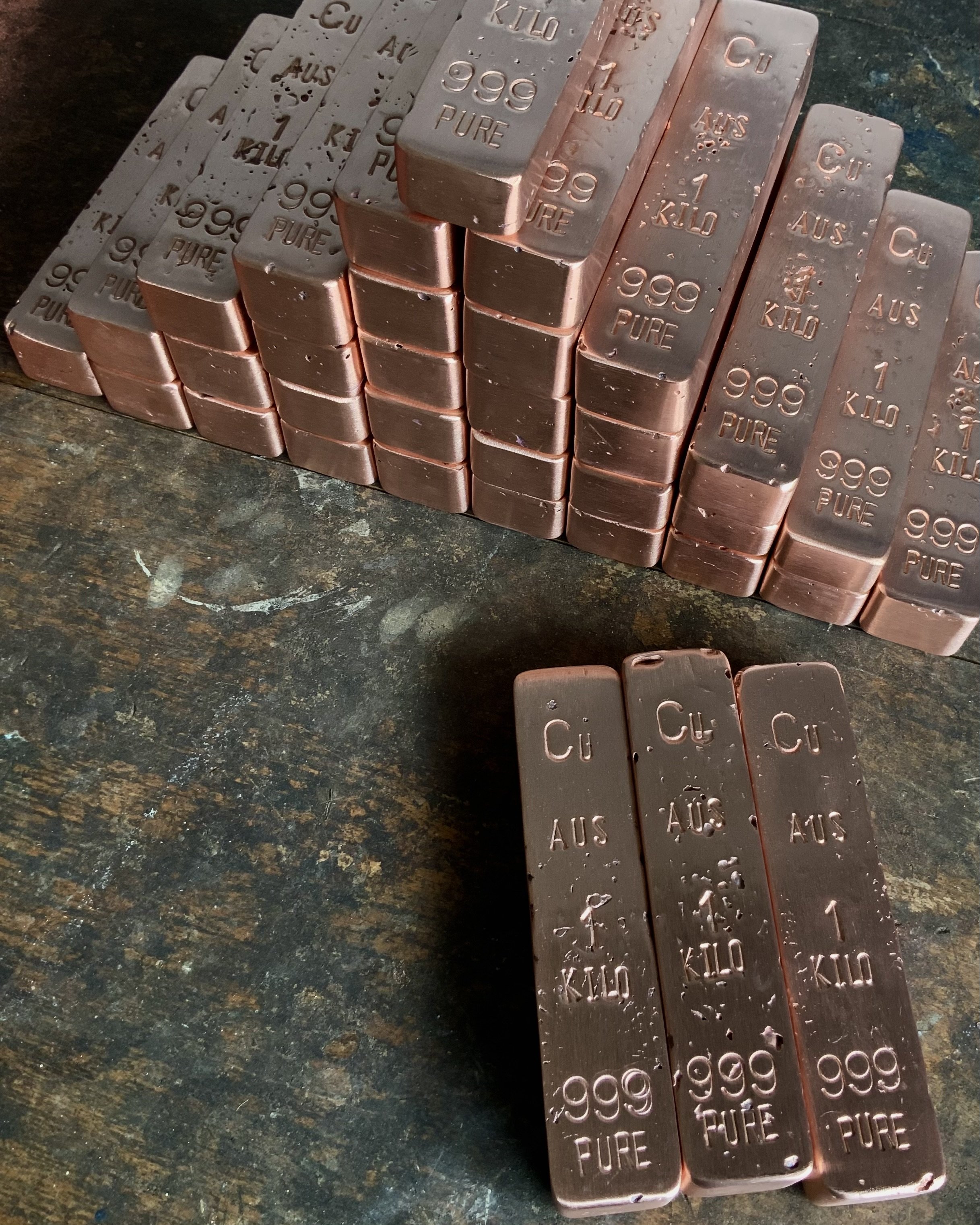 Mixed stack of copper bullion bars with front detail 999 fine Hinterland Bullion Co