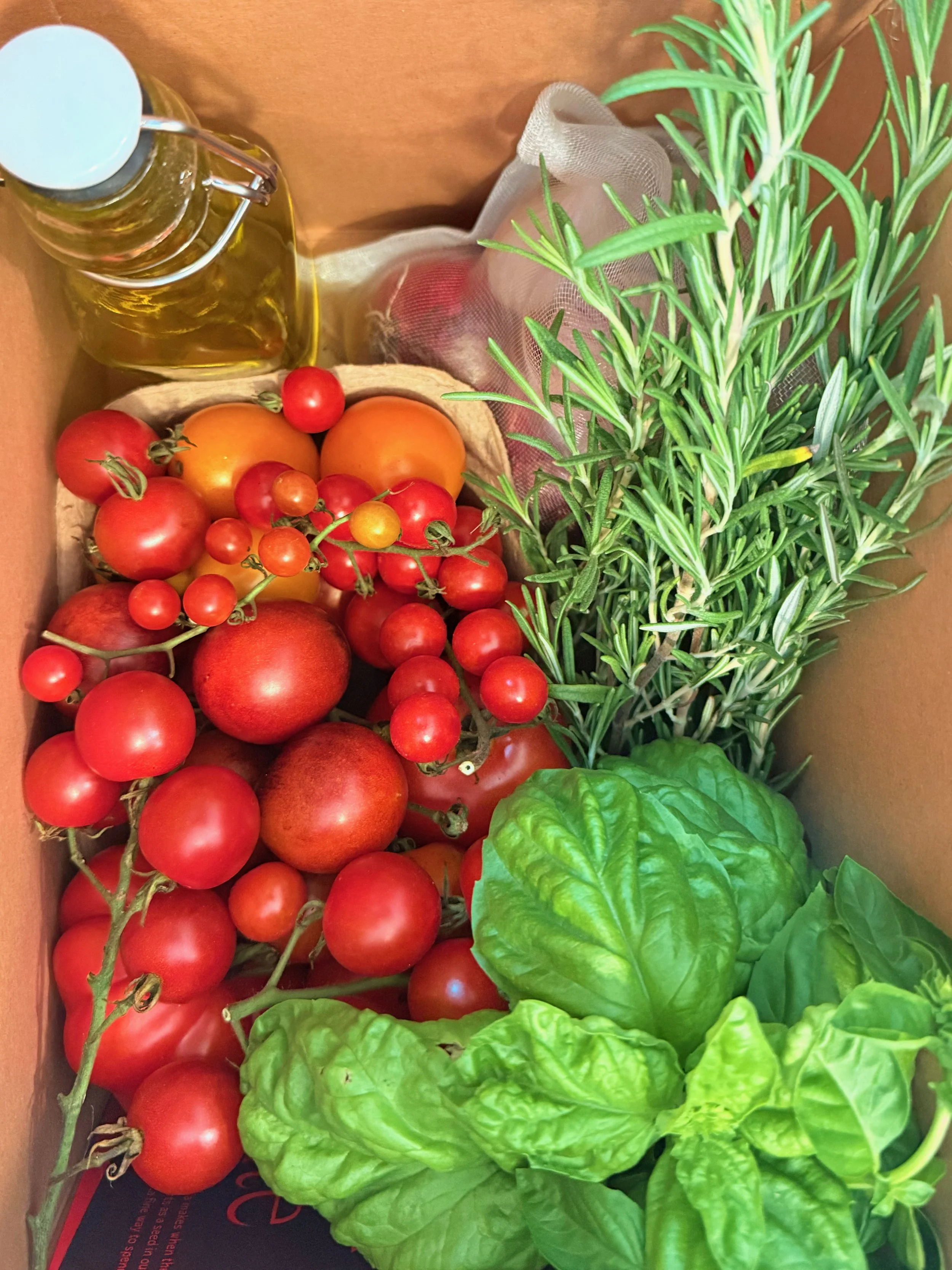 Heirloom vegetable box packed for Northwest Indiana delivery from Pandemonium Gardens