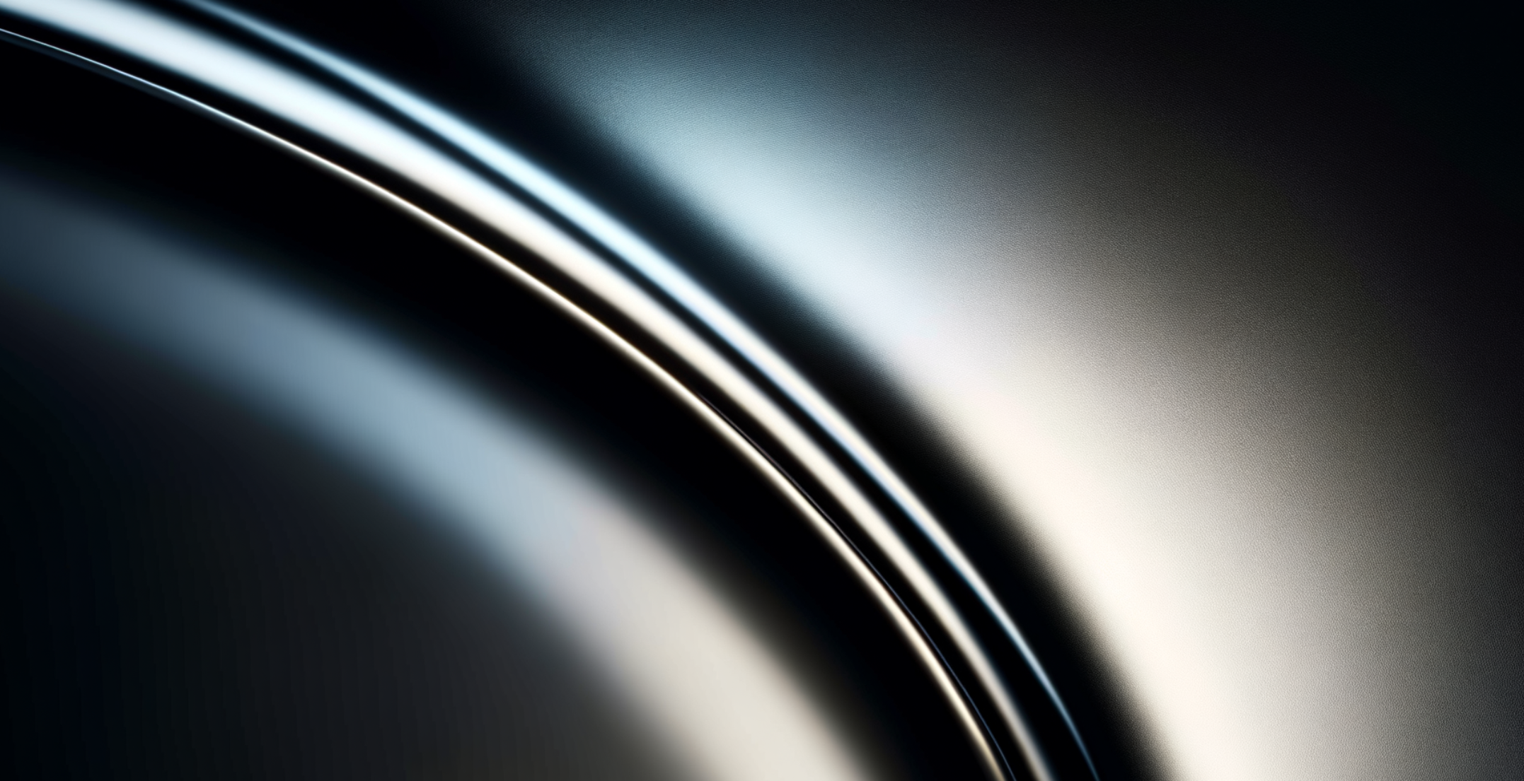 Close-up of a section of a metallic or polished surface with curved, reflective lines and gradient shading.