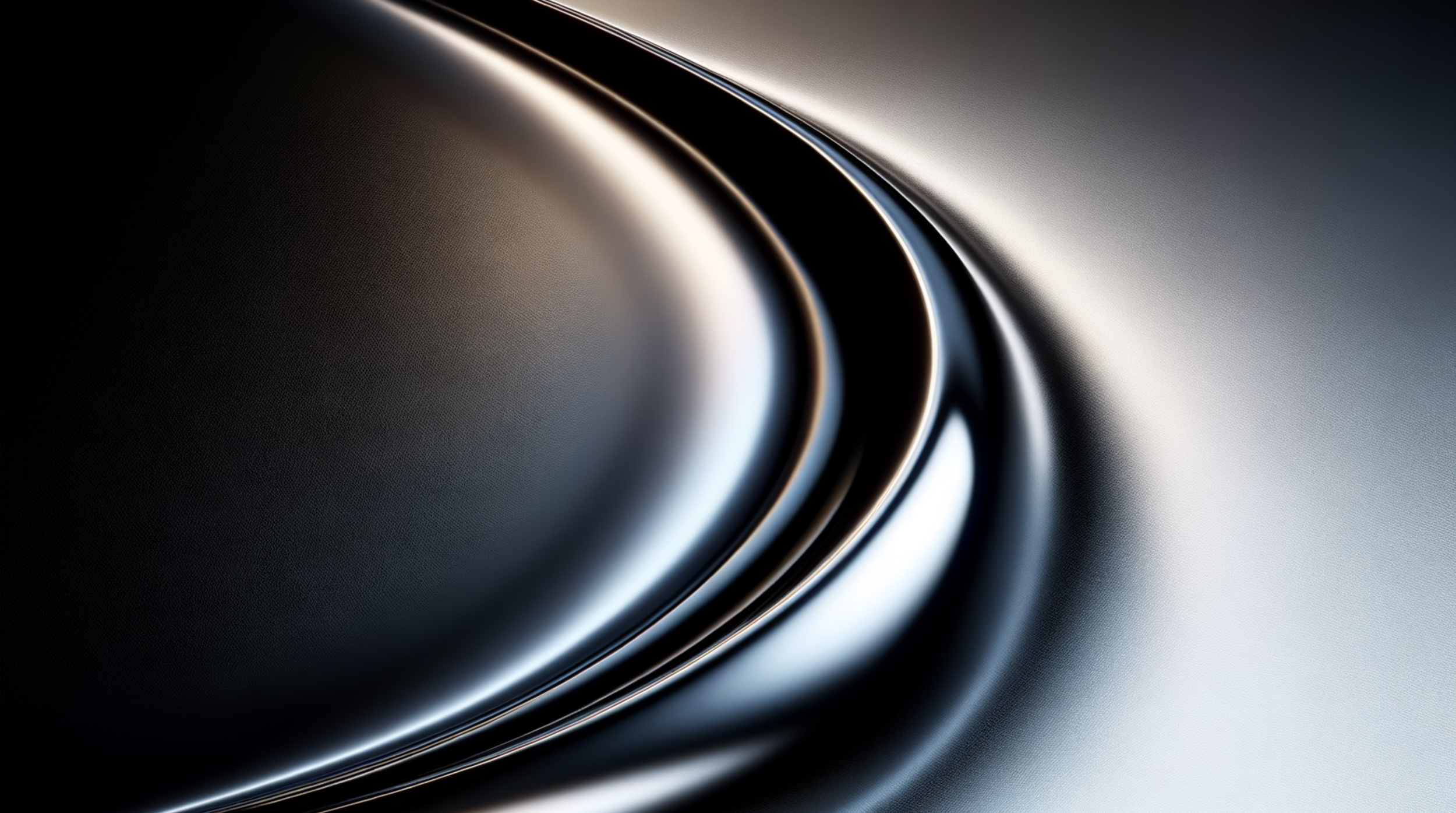 Close-up of a sleek, shiny metallic surface with curved lines and a gradient of dark to light colors.