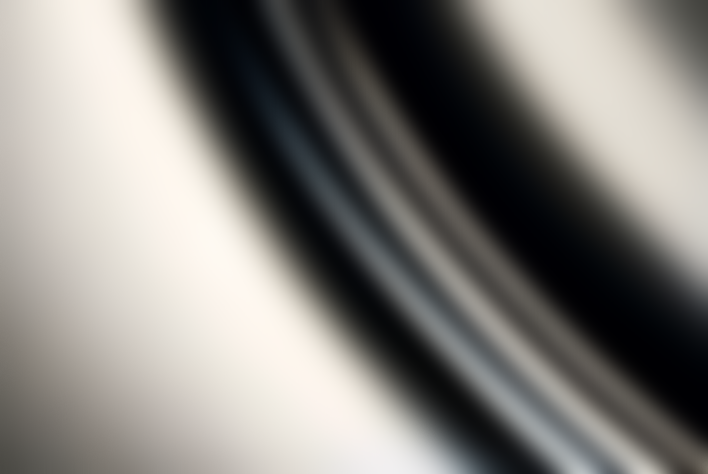 Close-up of blurred spinning vinyl record on turntable.