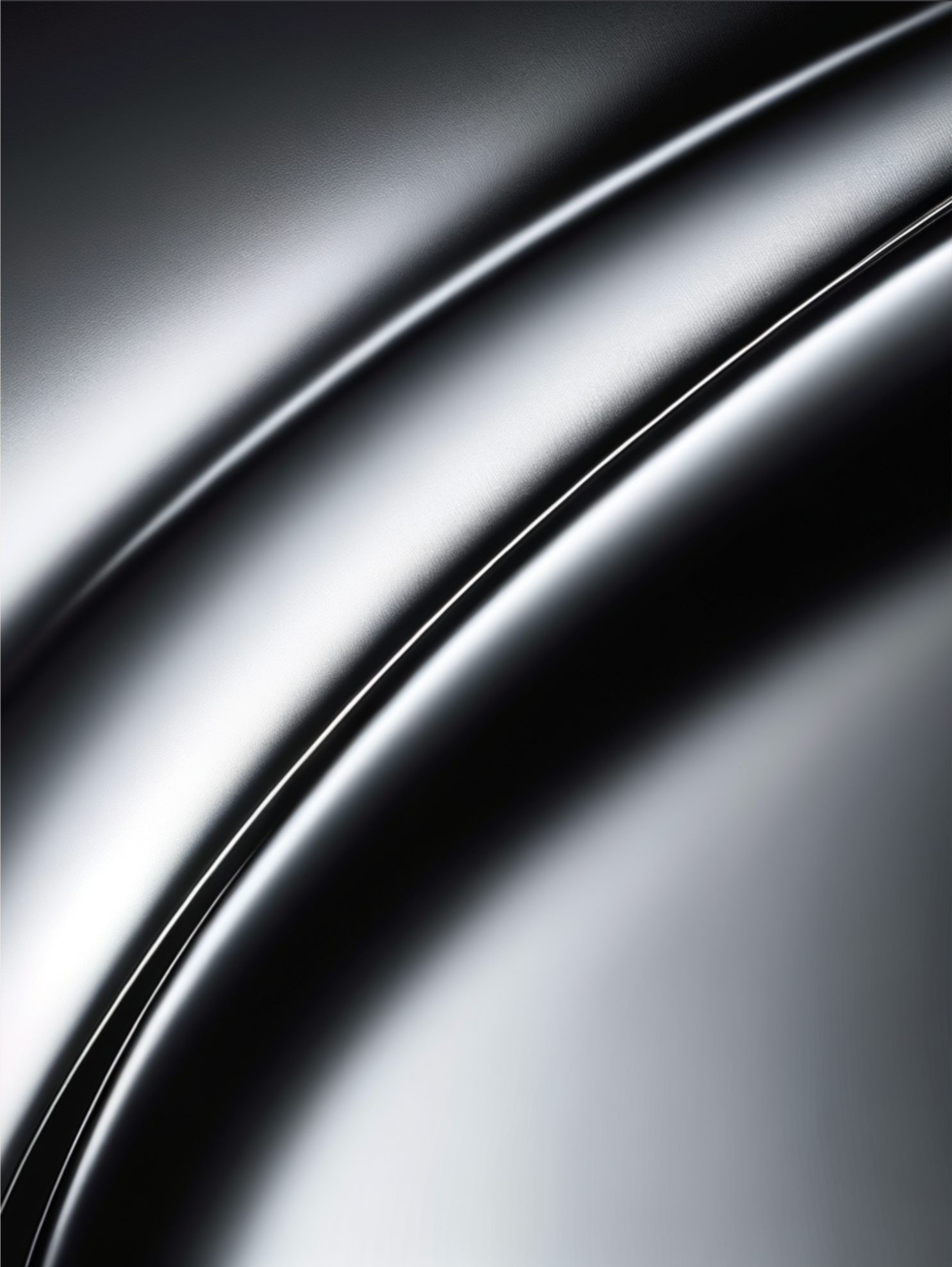 Close-up of a smooth, metallic surface with curved lines and reflections.