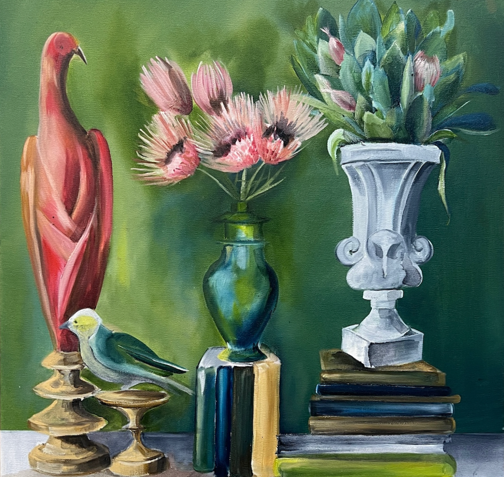 A painting of a still life arrangement with a tall red sculpture, a bird figurine, a green vase with pink flowers, a white ornate flower pot with greenery, and a stack of books against a green background.
