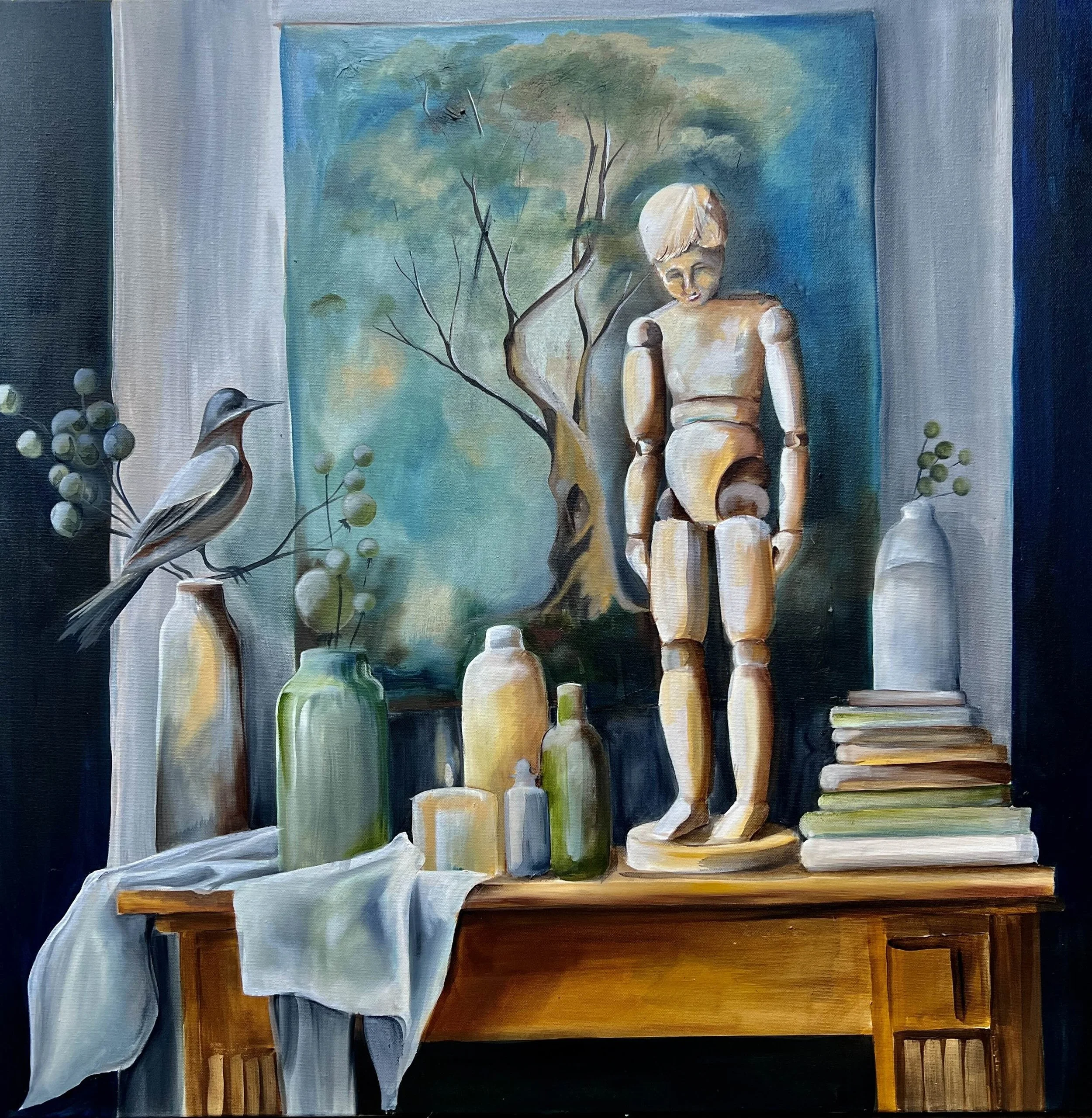 Still life painting featuring a wooden artist mannequin, various bottles and jars, a stack of books, a bird on a branch, a blue and green nature landscape, and a white cloth on a wooden table.