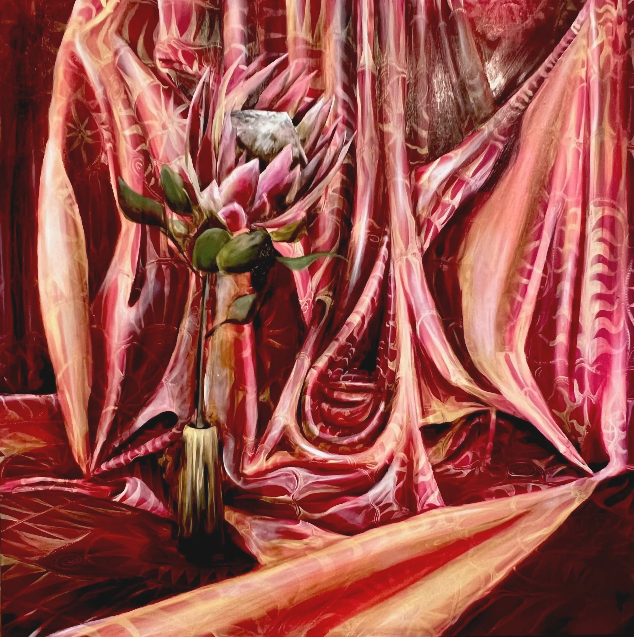 A vibrant abstract painting featuring a pink flower surrounded by flowing red and pink fabric-like textures.