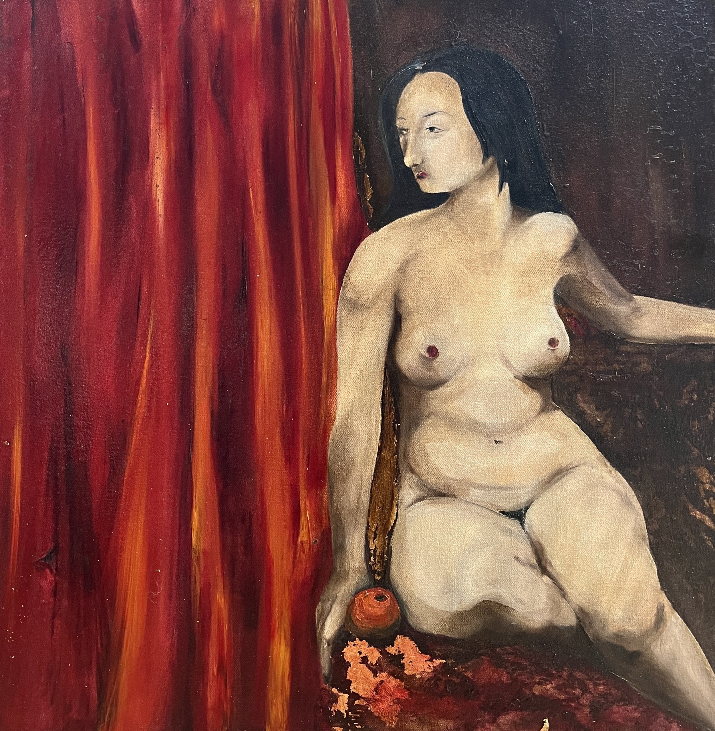 A nude woman with black hair sitting on a red surface, holding a small round object, with a dark background and a red curtain to the left.