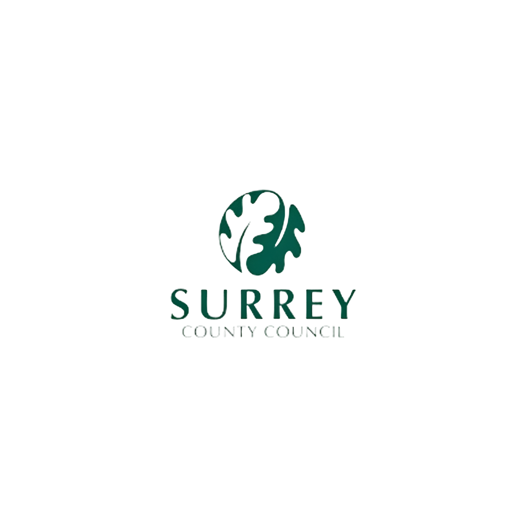 Surrey County Council logo featuring a dark green oak leaf within a circle above the organisation name in spaced green serif and sans-serif capitals