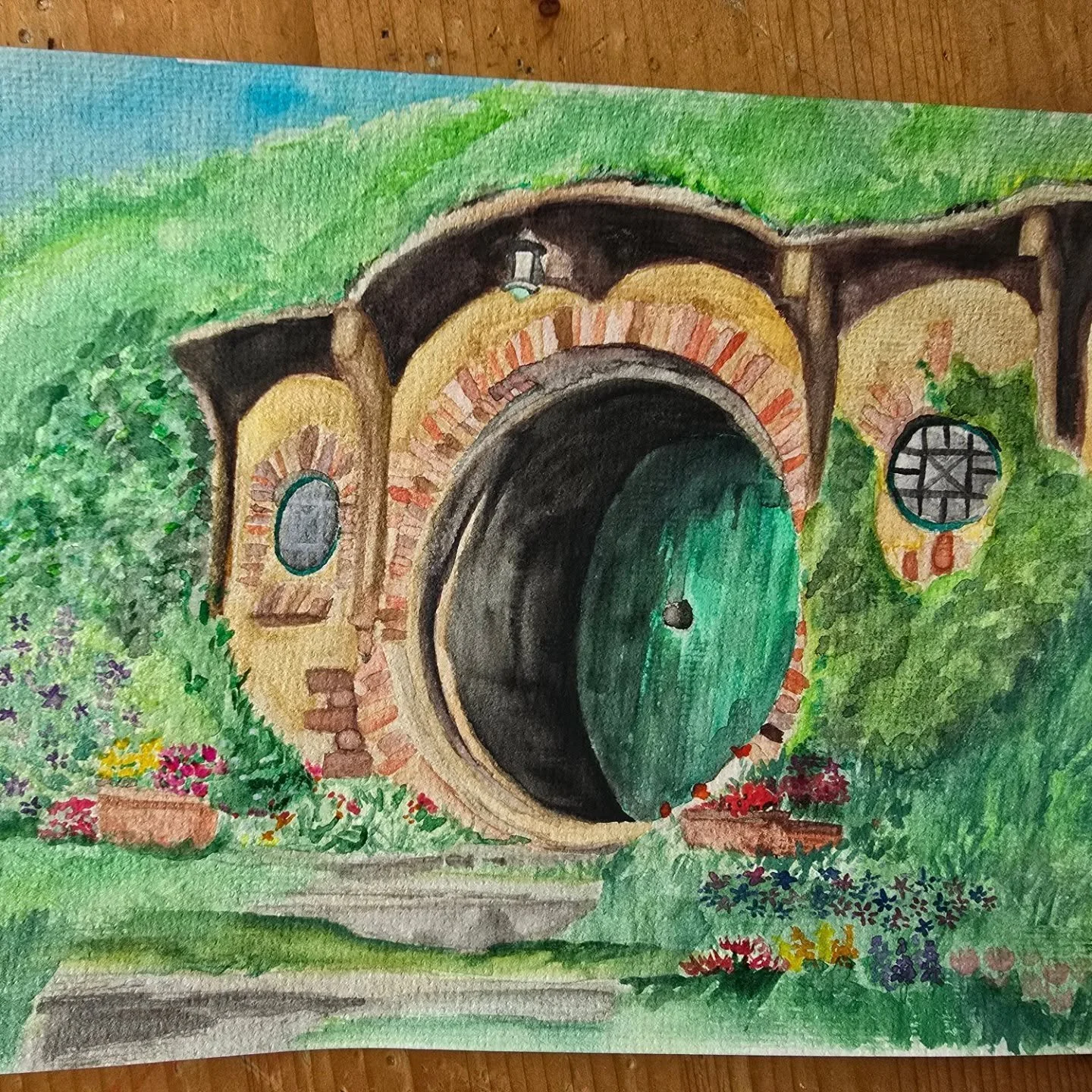 My first attempt at a watercolour painting so I thought I'd honour my favourite fantasy place - Middle Earth. I could happily spend the rest of my days as a Hobbit 

#theshire #lotr #hobbiton #watercolourpainting #booknerd