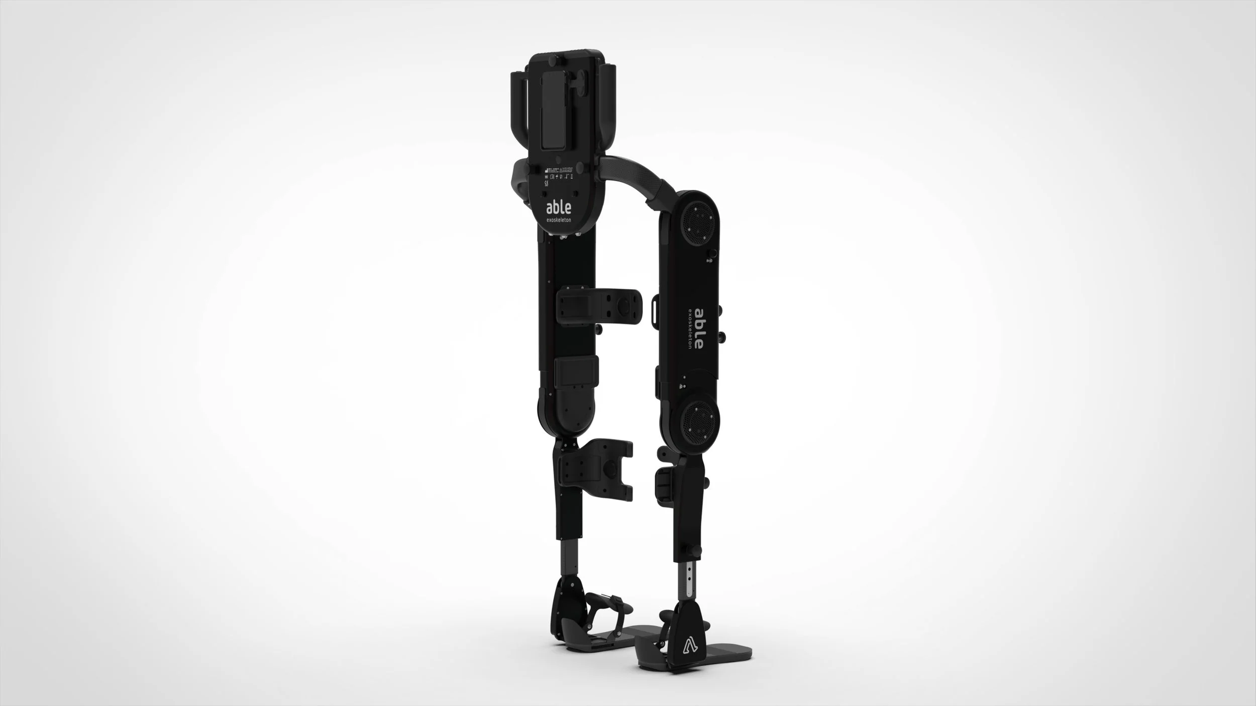 Black robotic exoskeleton suit standing upright on a plain white background.