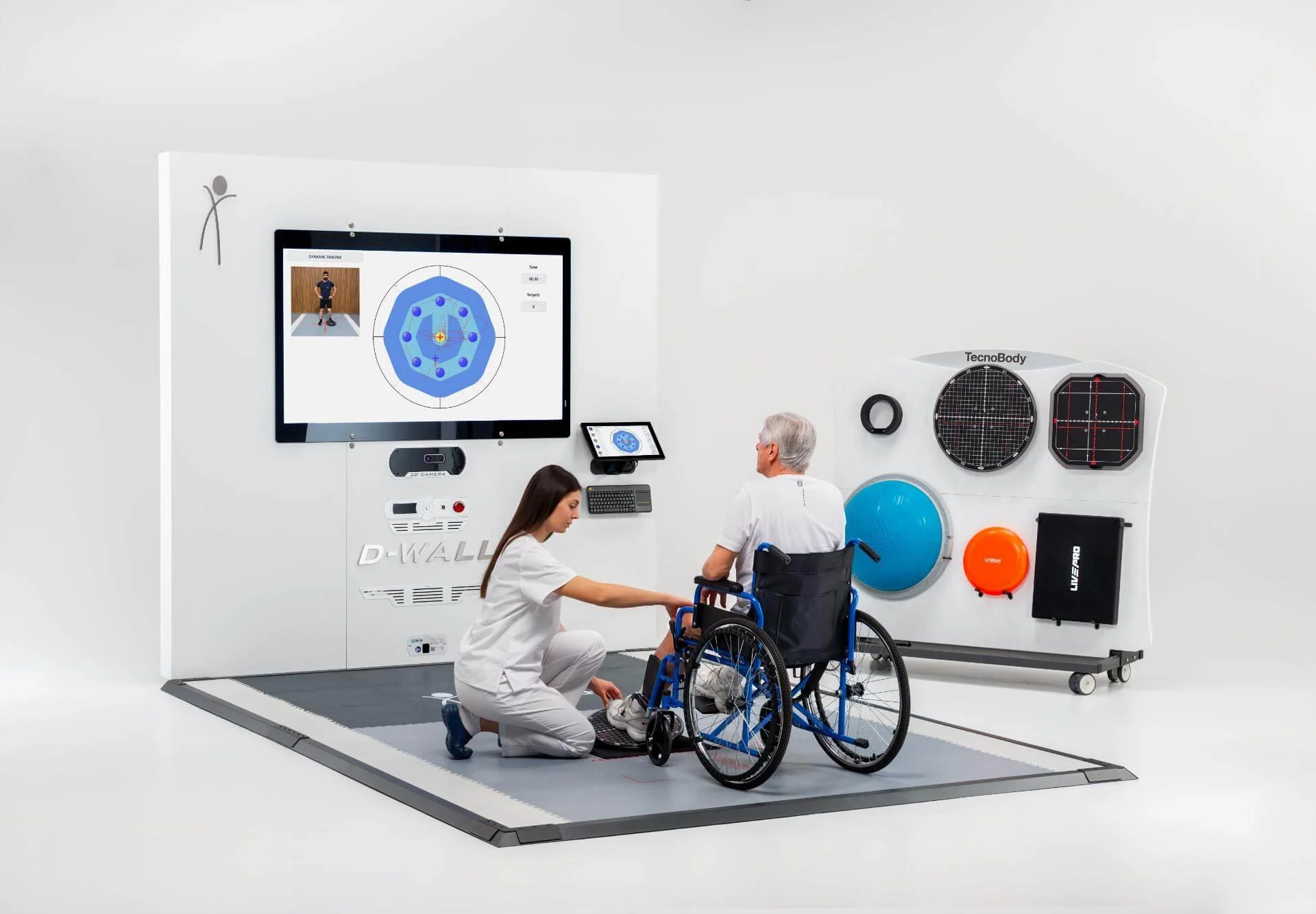 Medical professional assisting a man in a wheelchair during a gait analysis or physical therapy session, with equipment and screens in a clinical setting.