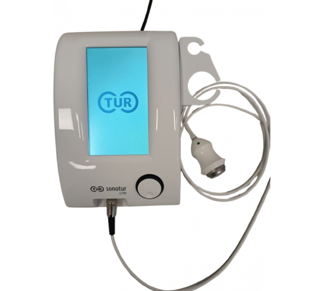 A white electronic device with a blue screen displays the logo 'TUR'. It has a black cable connected at the bottom and a white earpiece with a cord attached on the side.