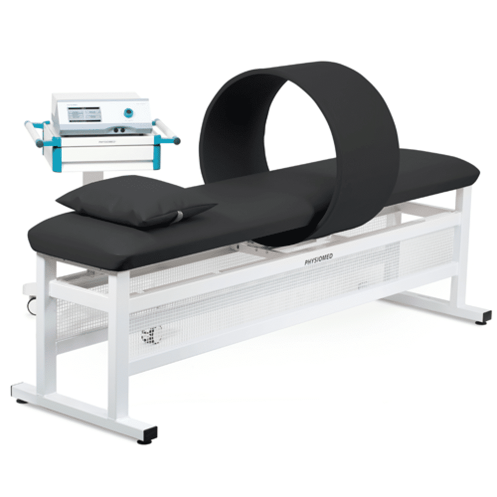 A medical imaging machine with a black circular scanner and a padded examination table with a pillow, used for MRI scans.